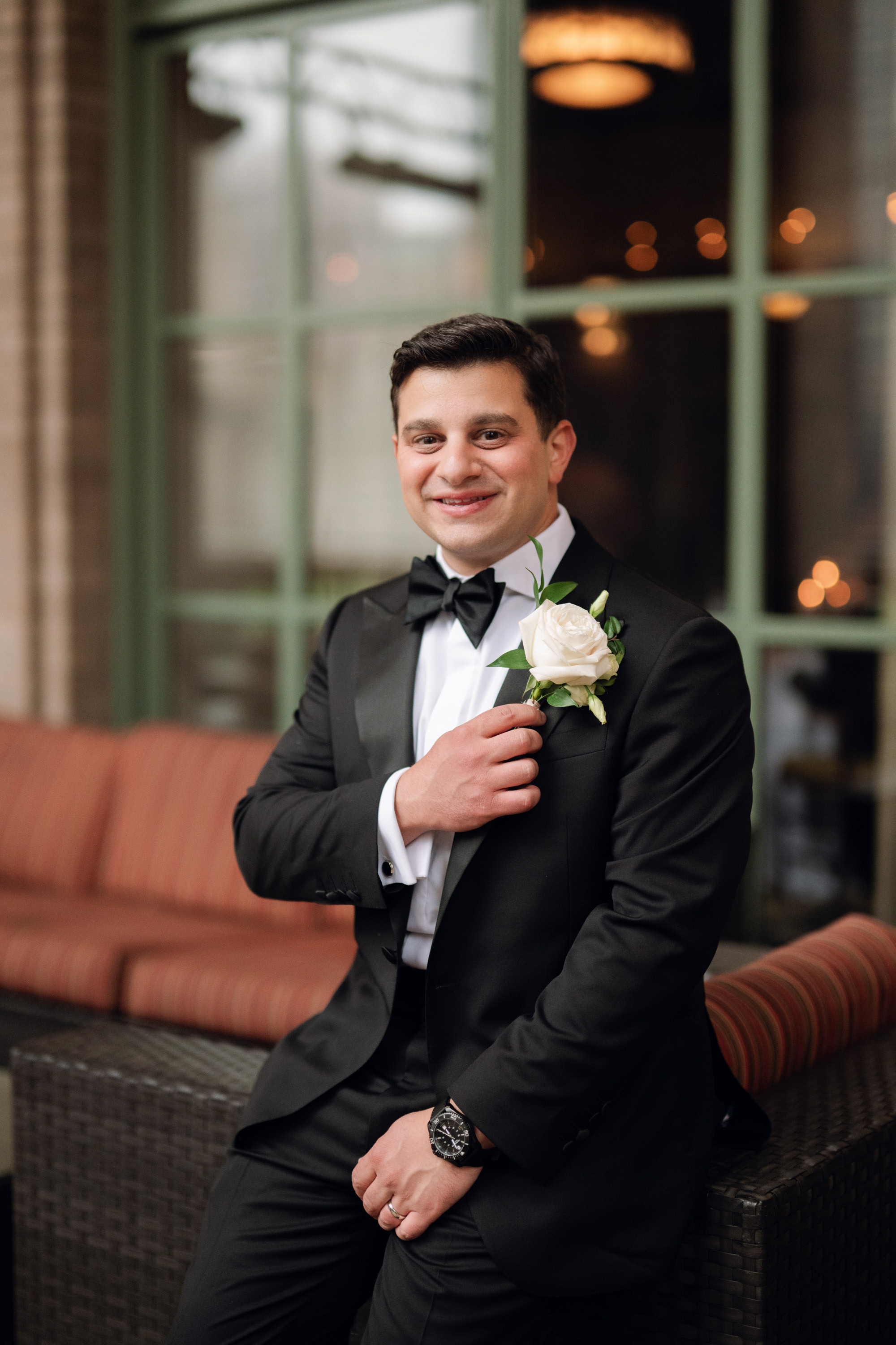a man in a tuxed suit and bow tie