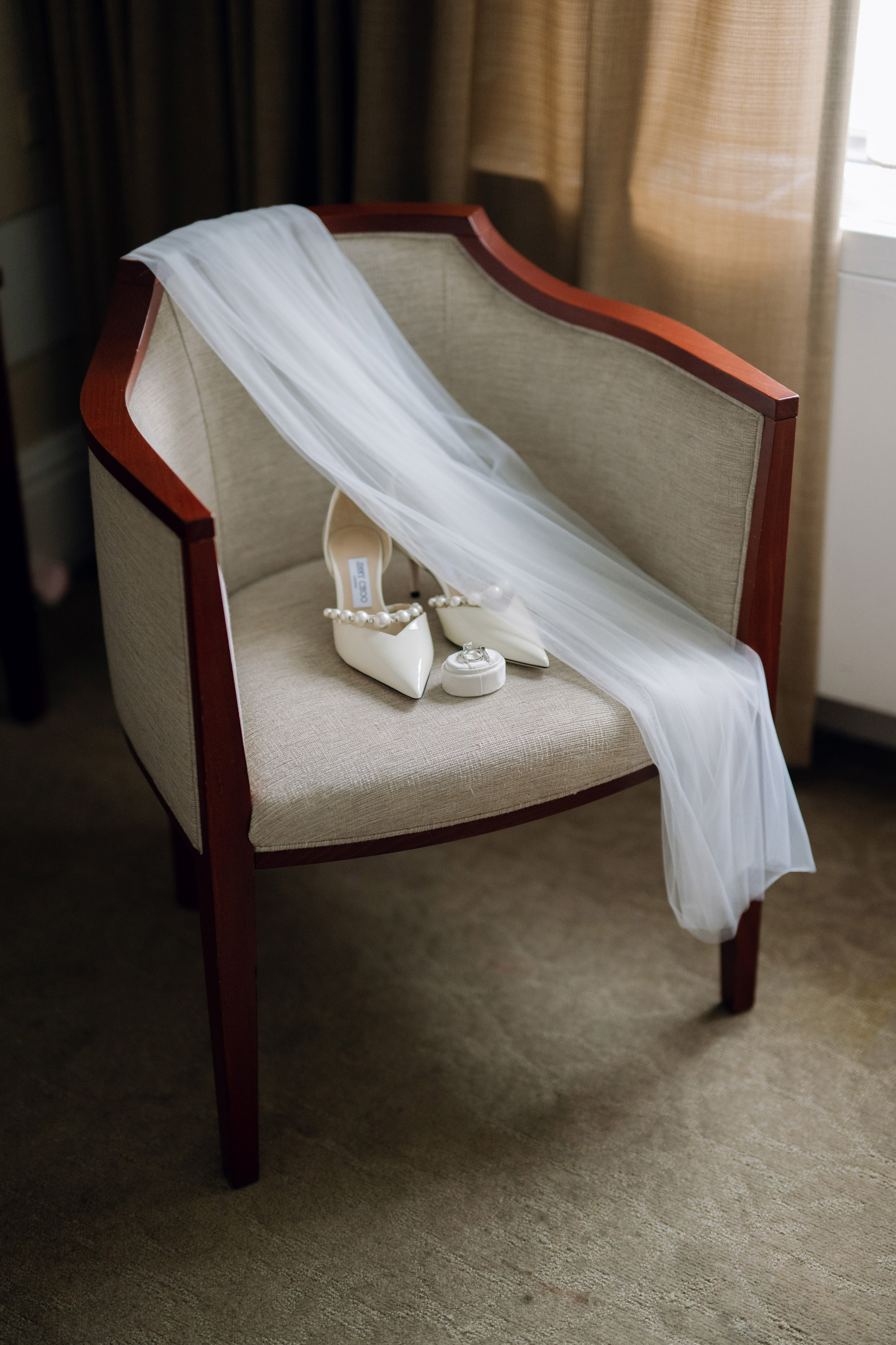 a pair of shoes is sitting on a chair