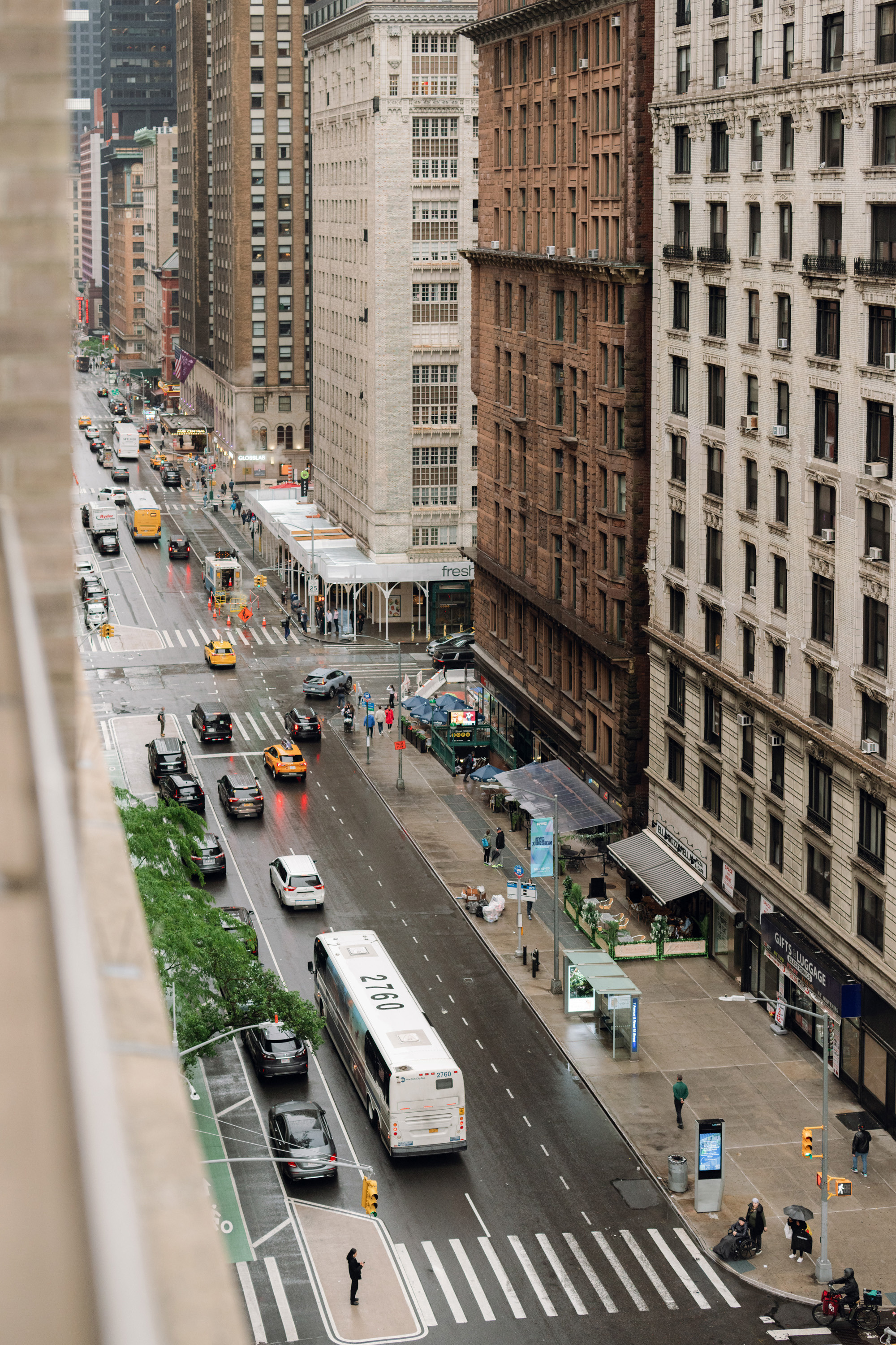 a city street with a bus and a bus
