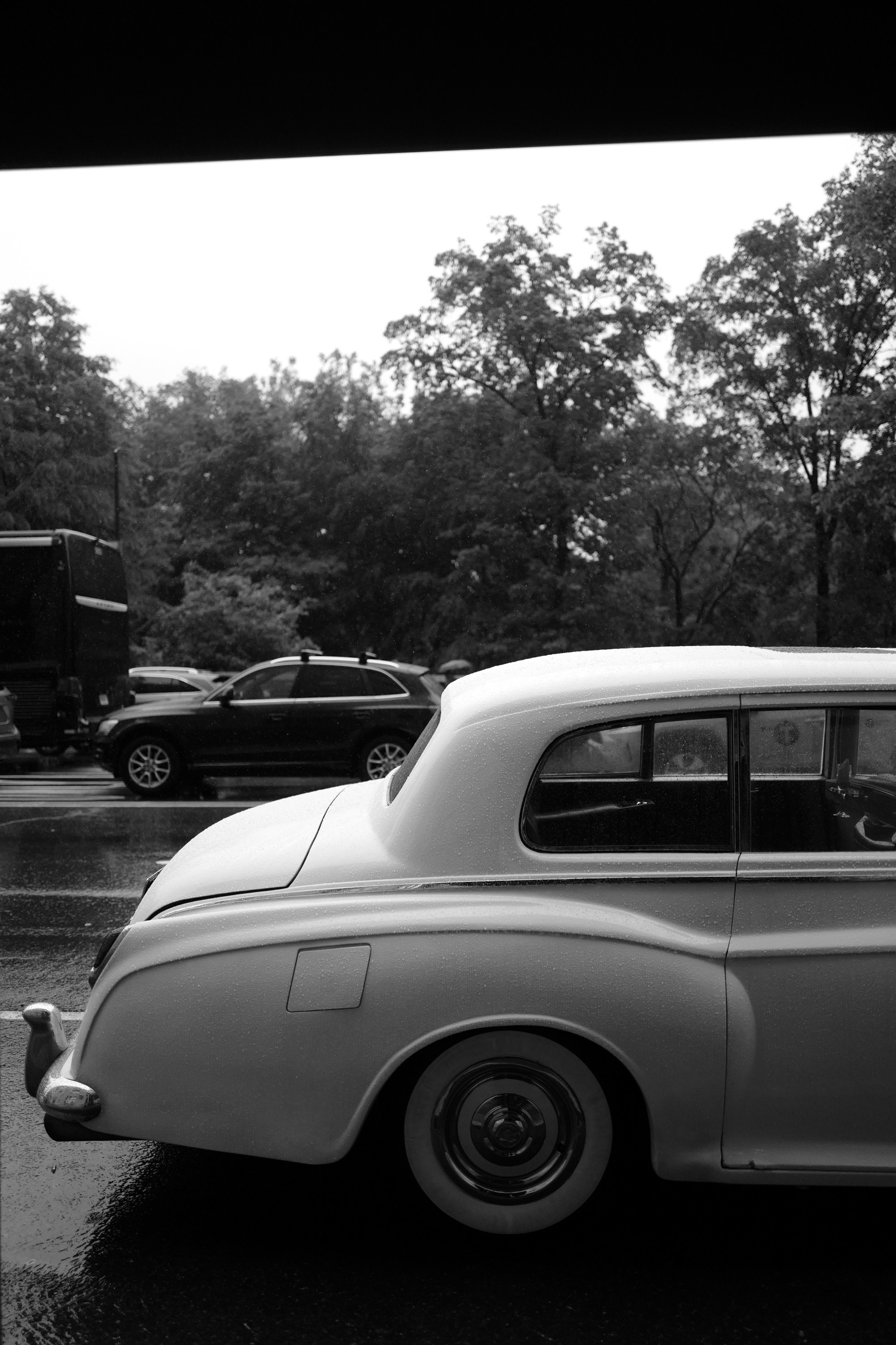a white car parked in a parking lot
