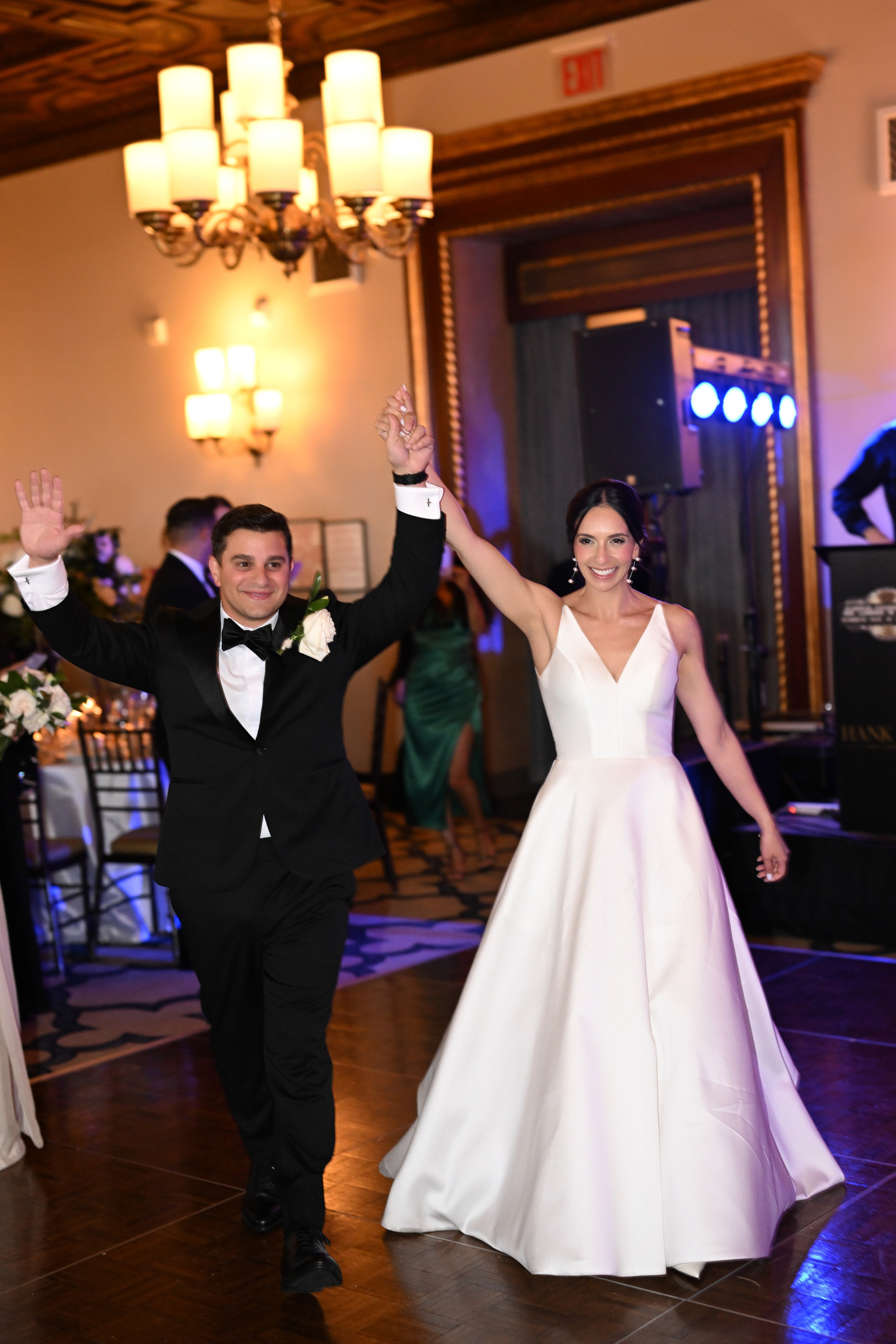 a bride and groom dancing on the dance floor