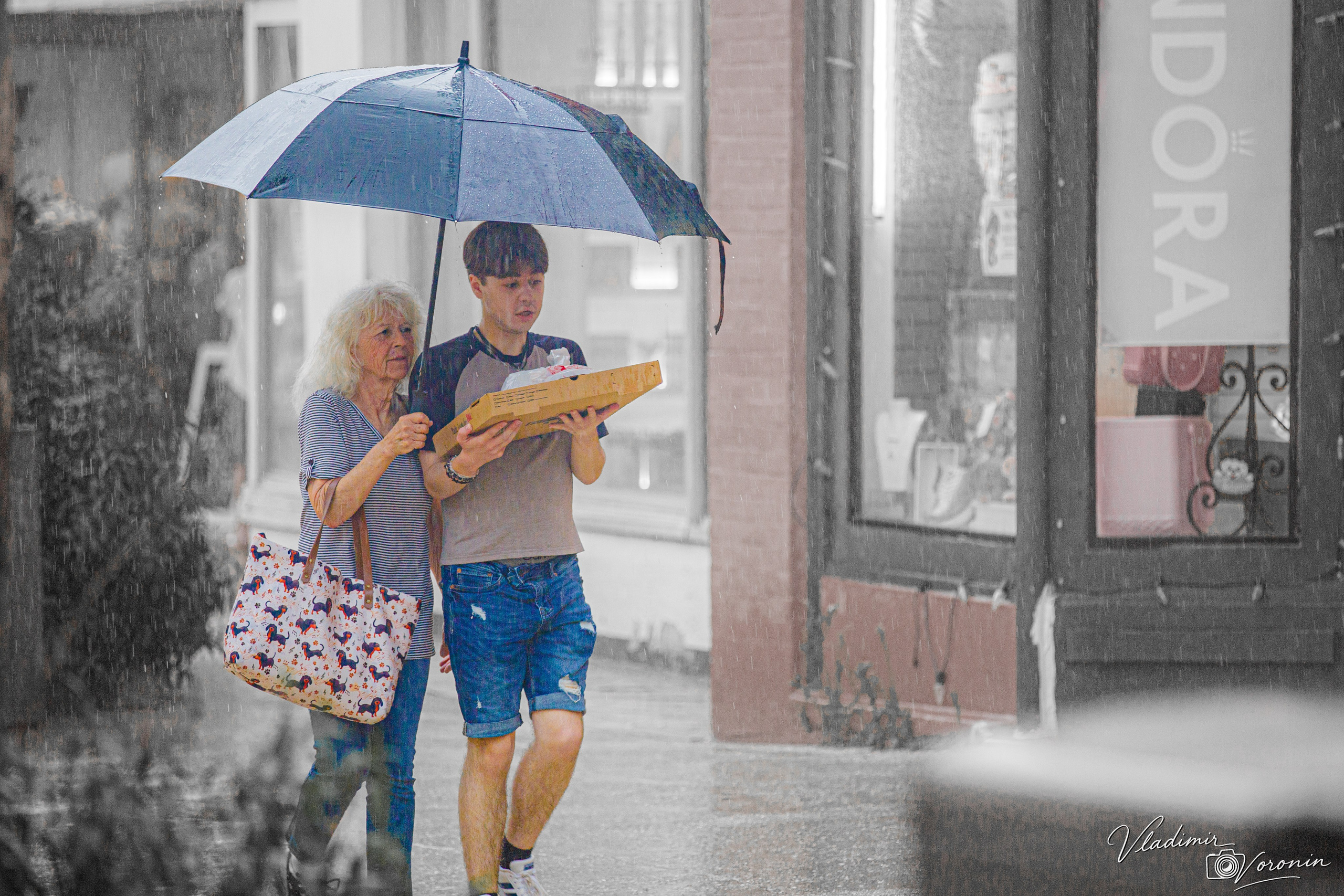 Rain in downtown. Photographer St. Augustine