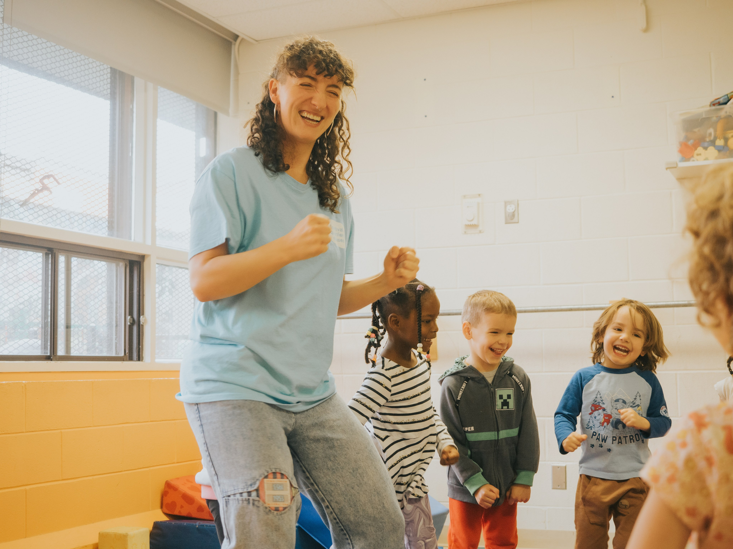 Dance teacher showing dance moves.