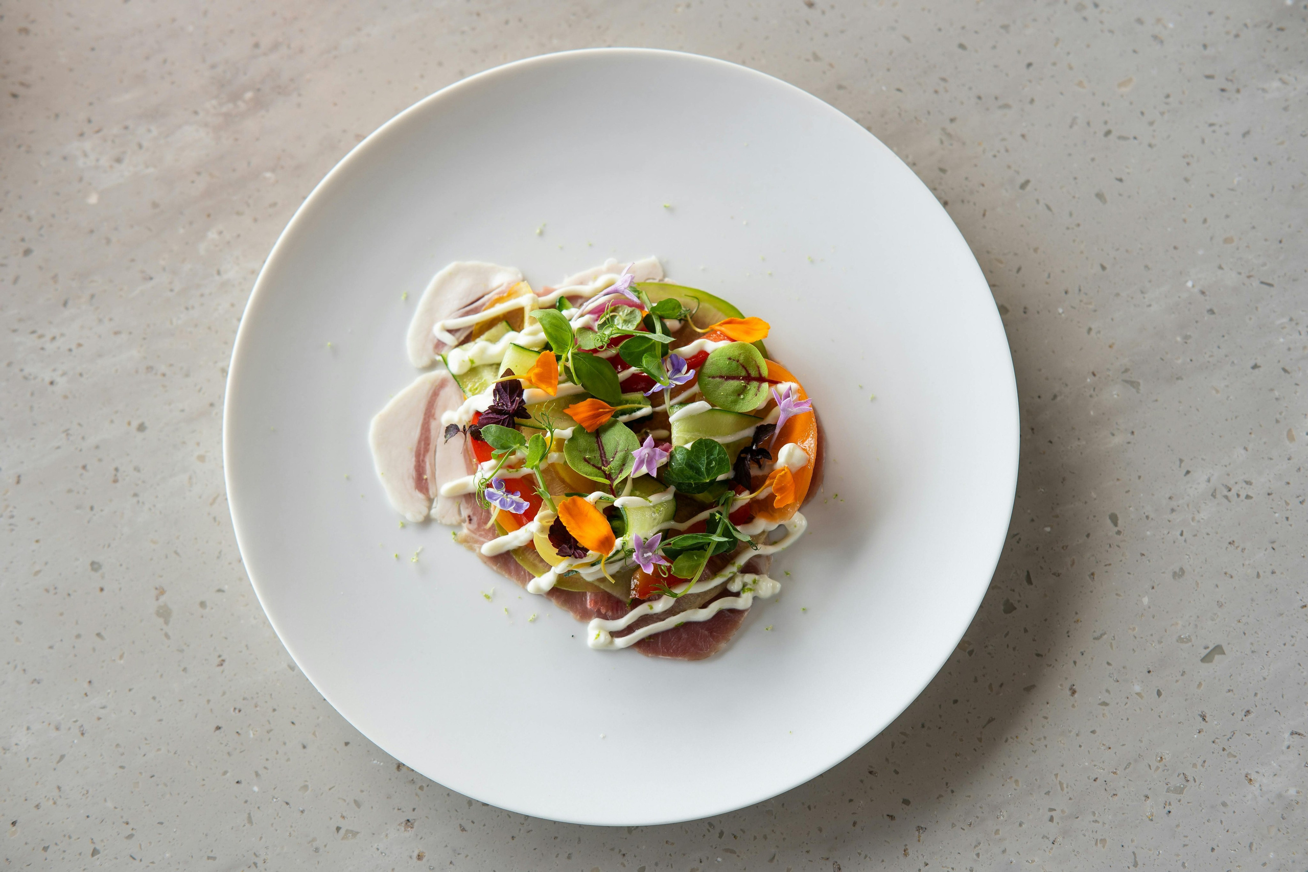 Editorial food photography of fresh salad with vegetables and herbs, captured by London food photographer Jay Soundo