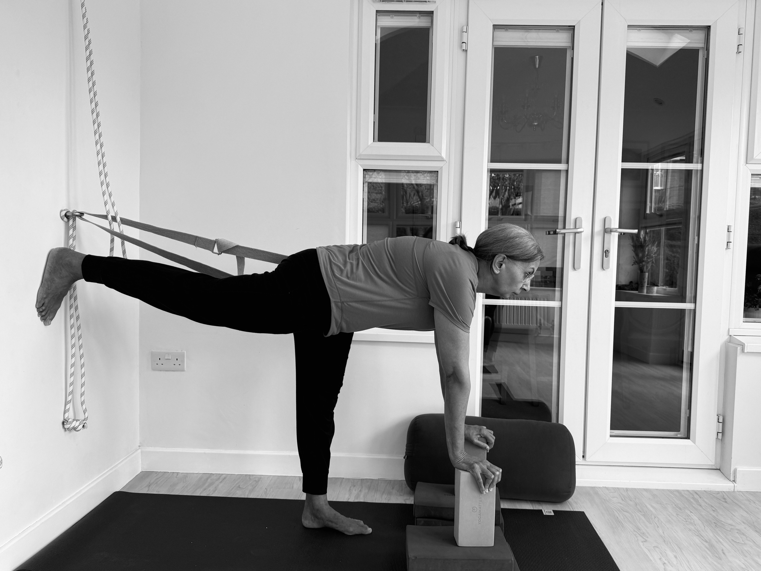 Supported Iyengar yoga with ropes