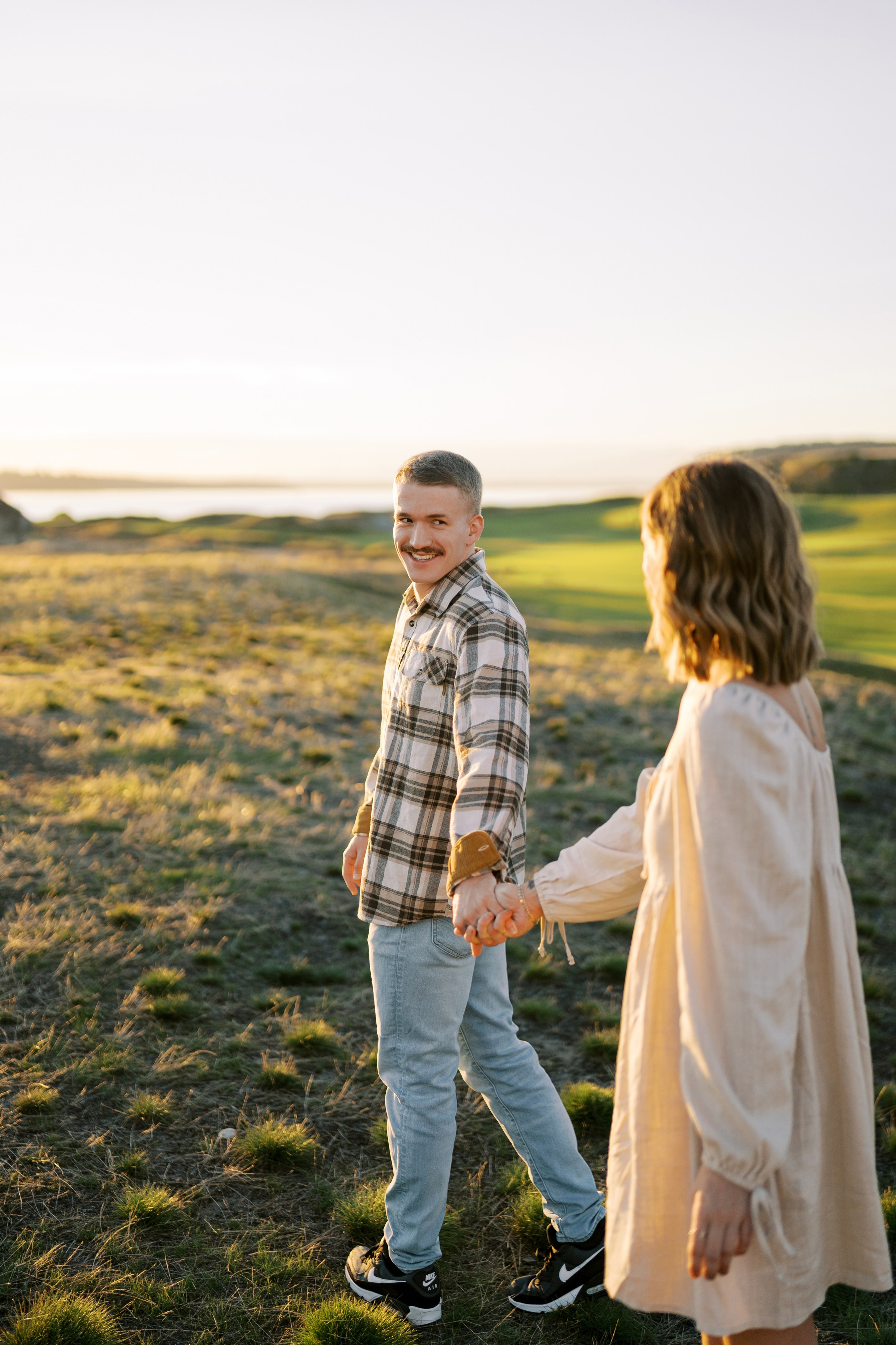A story of incredible love at sunset. September 2024. Tacoma, Chambers Bay Golf Course. EVAN ARISTOV WEDDING PHOTOGRAPHY — Seattle Wedding Photographer