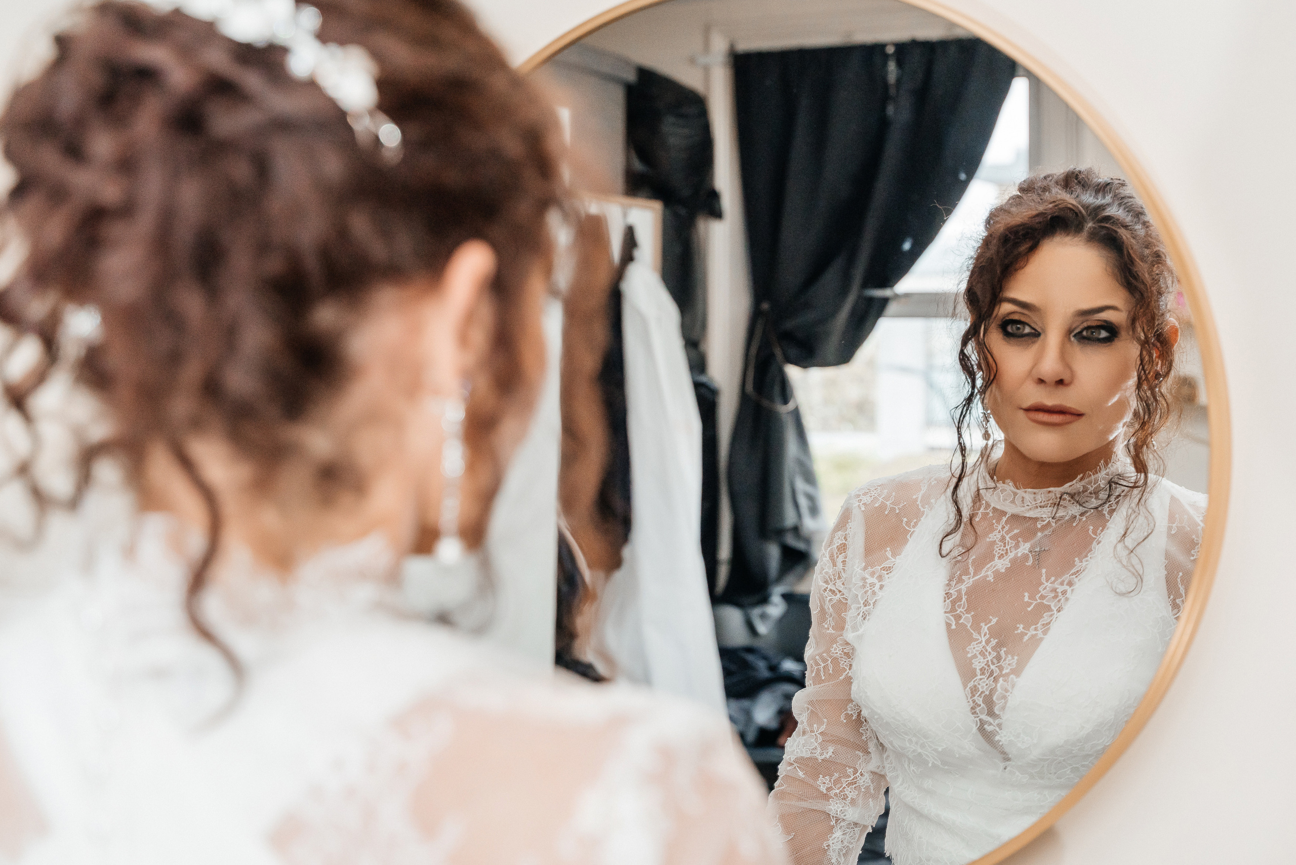Bride in front of a mirror