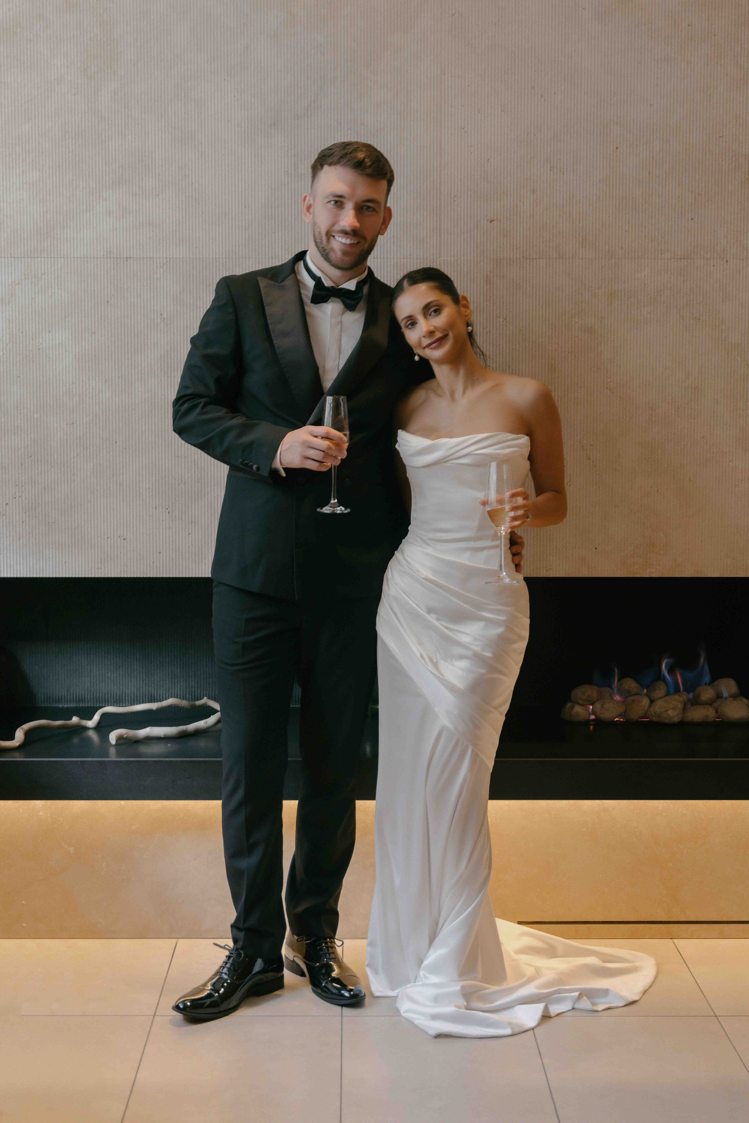 classic wedding portrait London bride and groom looking at camera elegant Marylebone Town Hall wedding photography UK