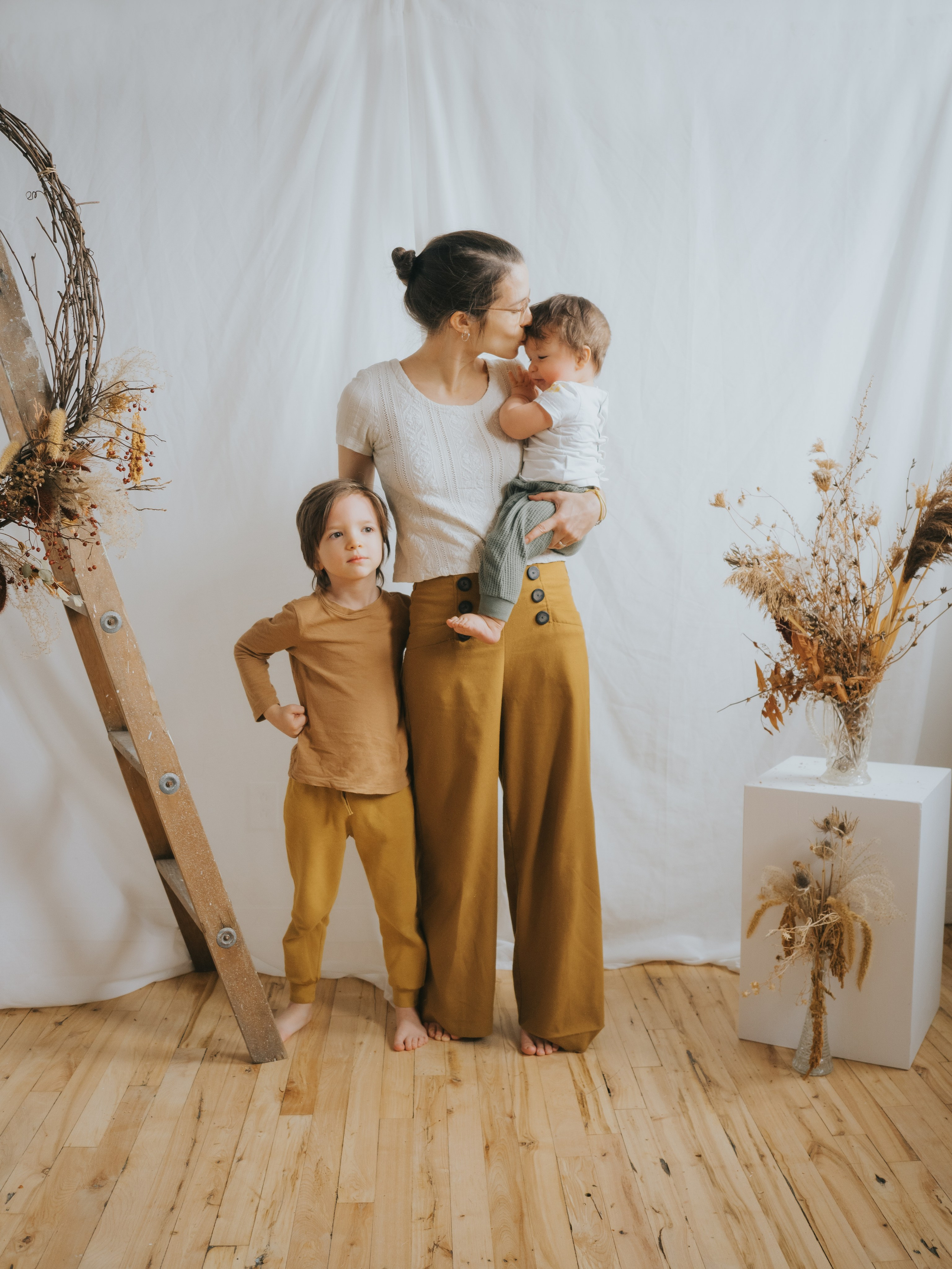 Mother with two sons posing for Mothers Day Mini Session in Montreal.