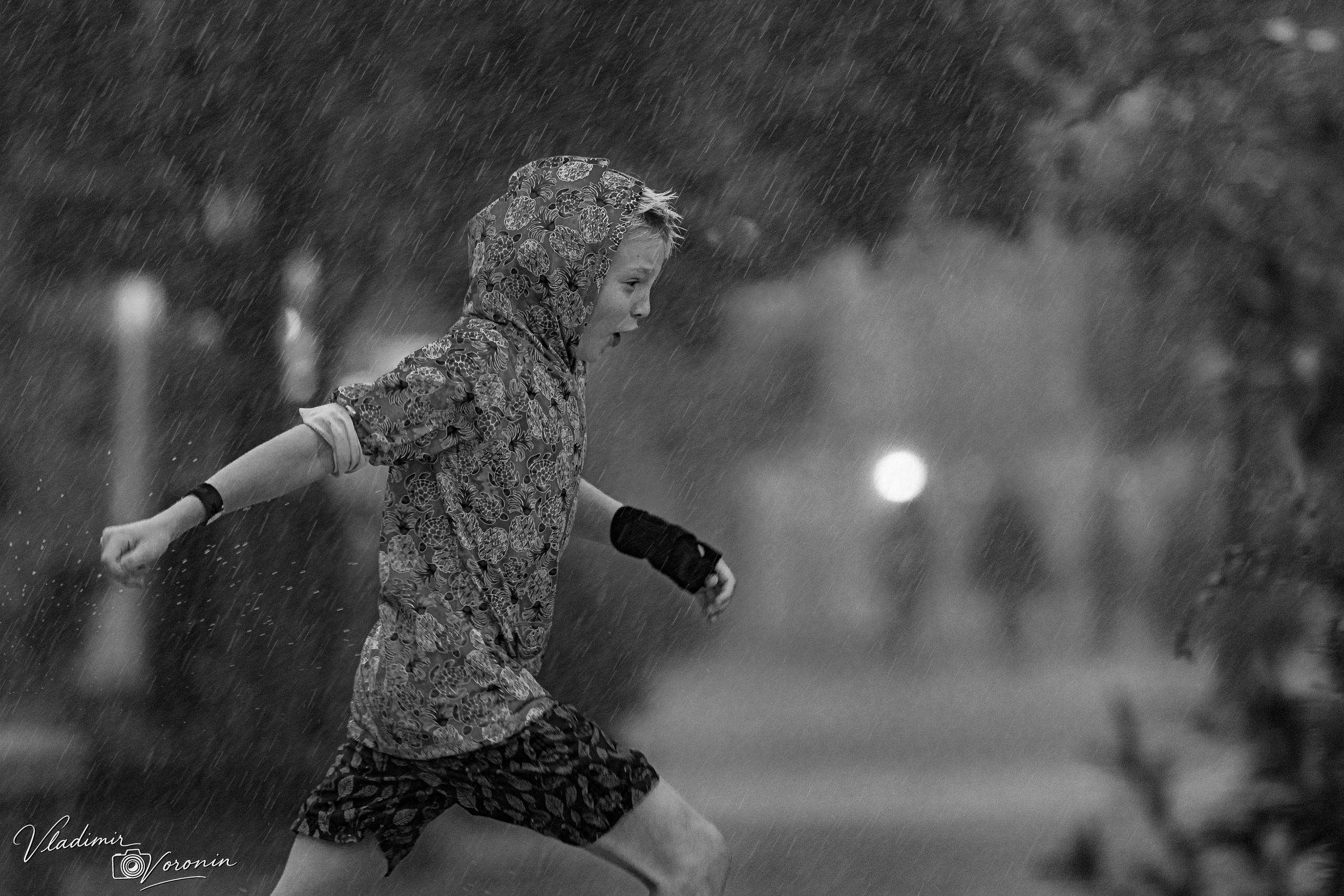 Rain in downtown. Photographer St. Augustine
