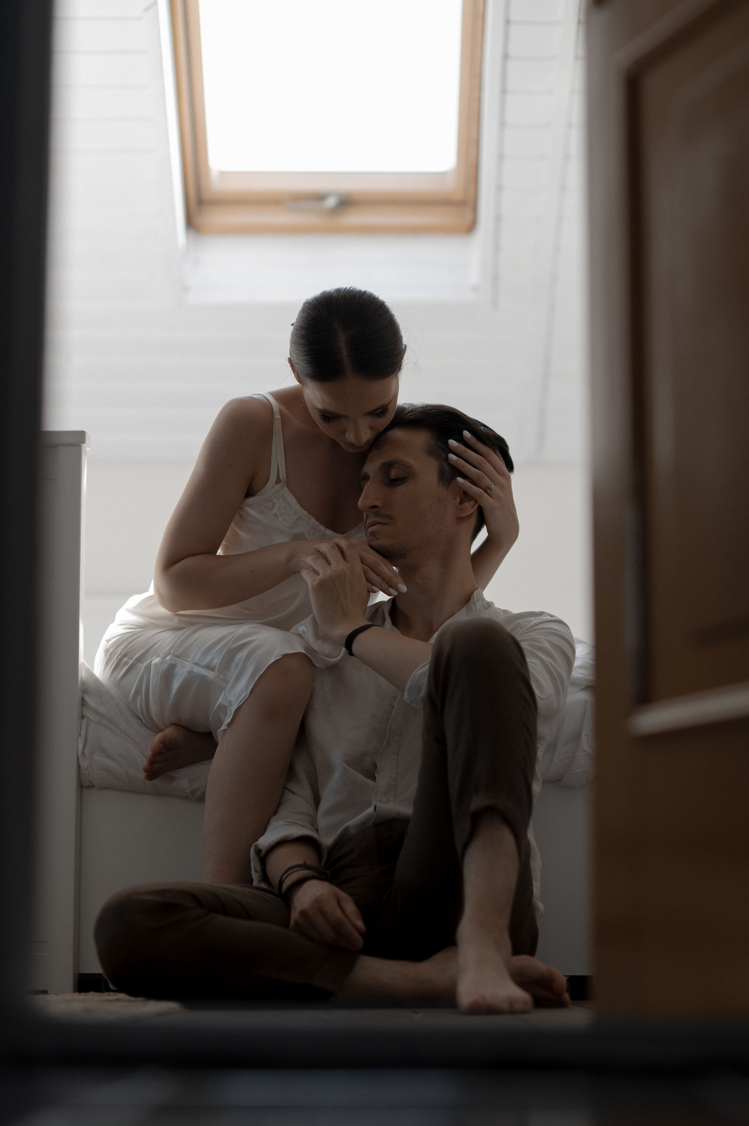 Secluded from the world, the couple's bond blossoms as they revel in the intimacy of their wedding morning, creating cherished memories in the embrace of their cozy bed.