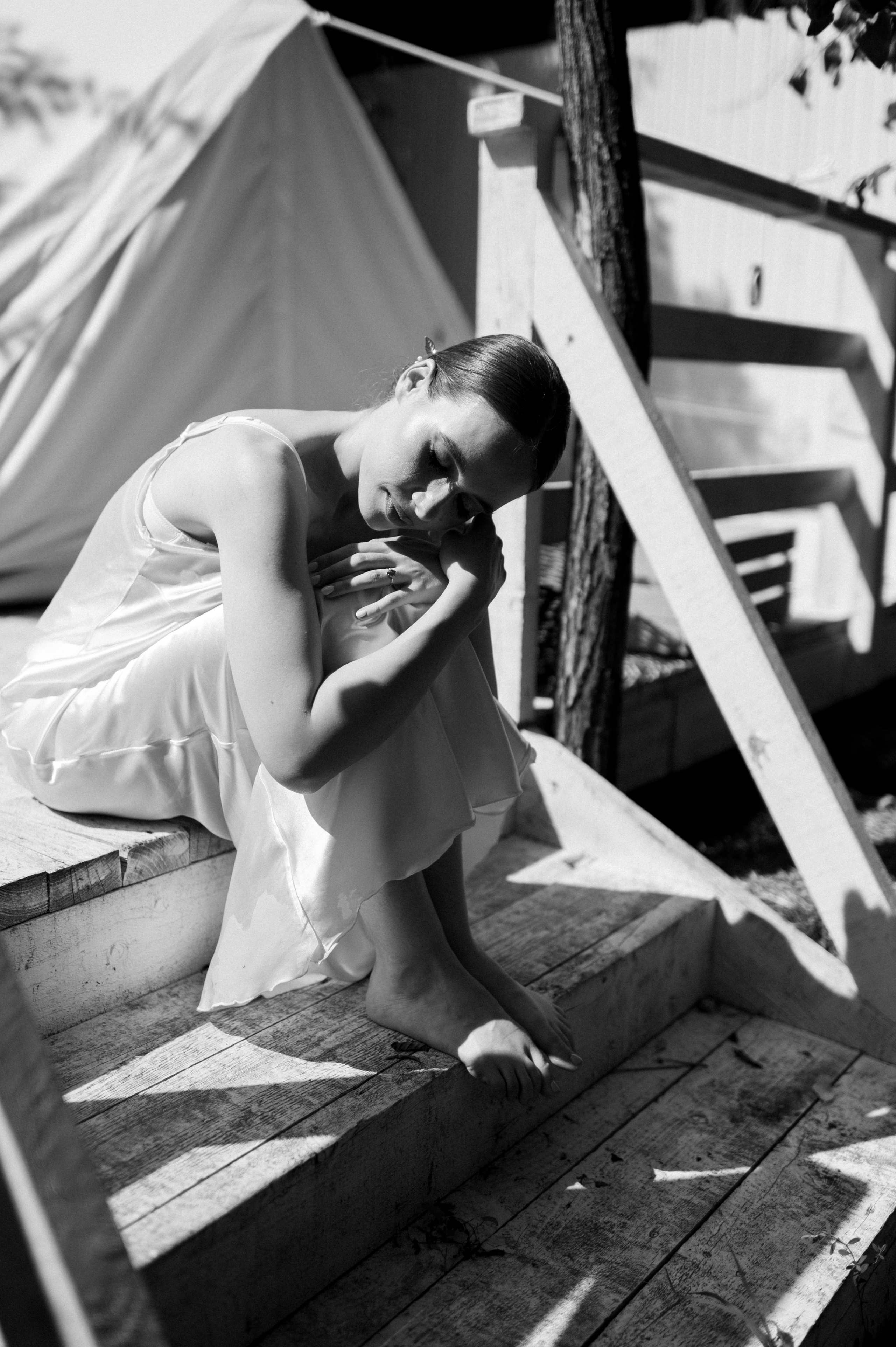 In the tranquil moments of the wedding morning, the delicate bride's satin dress shimmers with grace, illuminating her path to everlasting love.