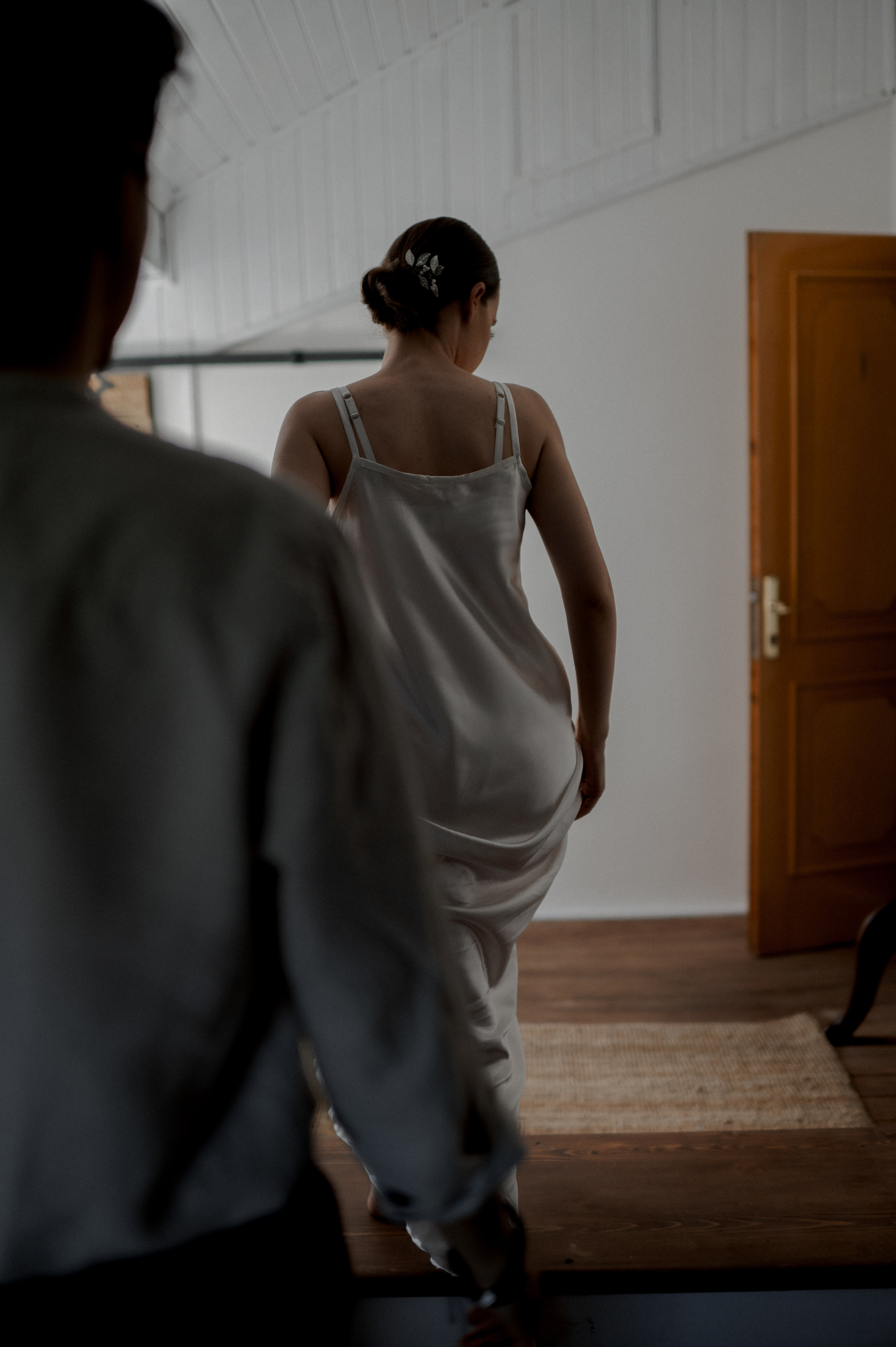 With pure joy and excitement, the couple dances in the room, their love illuminating every step, creating a magical atmosphere filled with laughter and happiness.