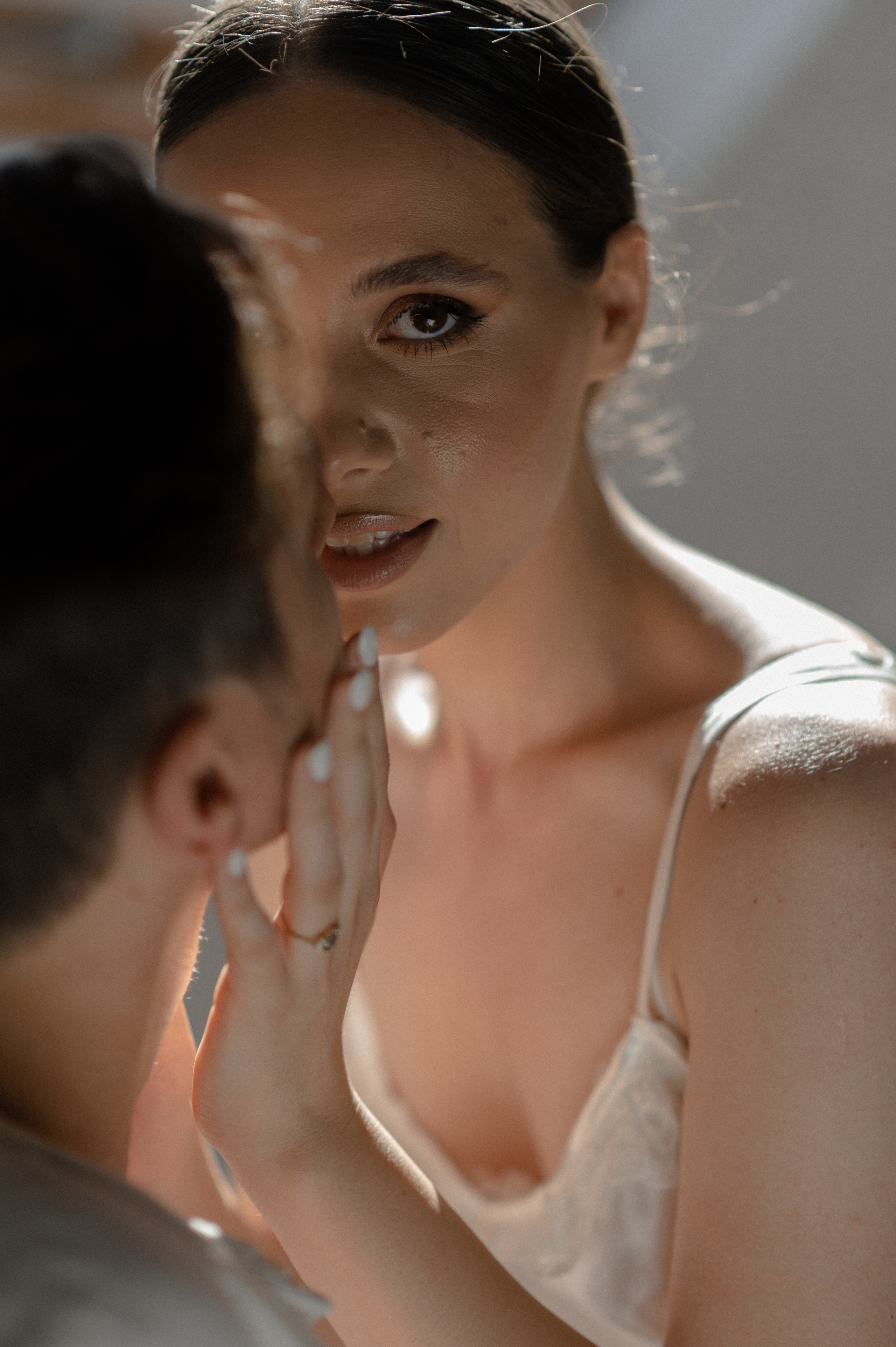 With a sense of seclusion, the couple finds solace in the warmth of their bed, enveloped in an atmosphere of intimacy that symbolizes the depth of their love.