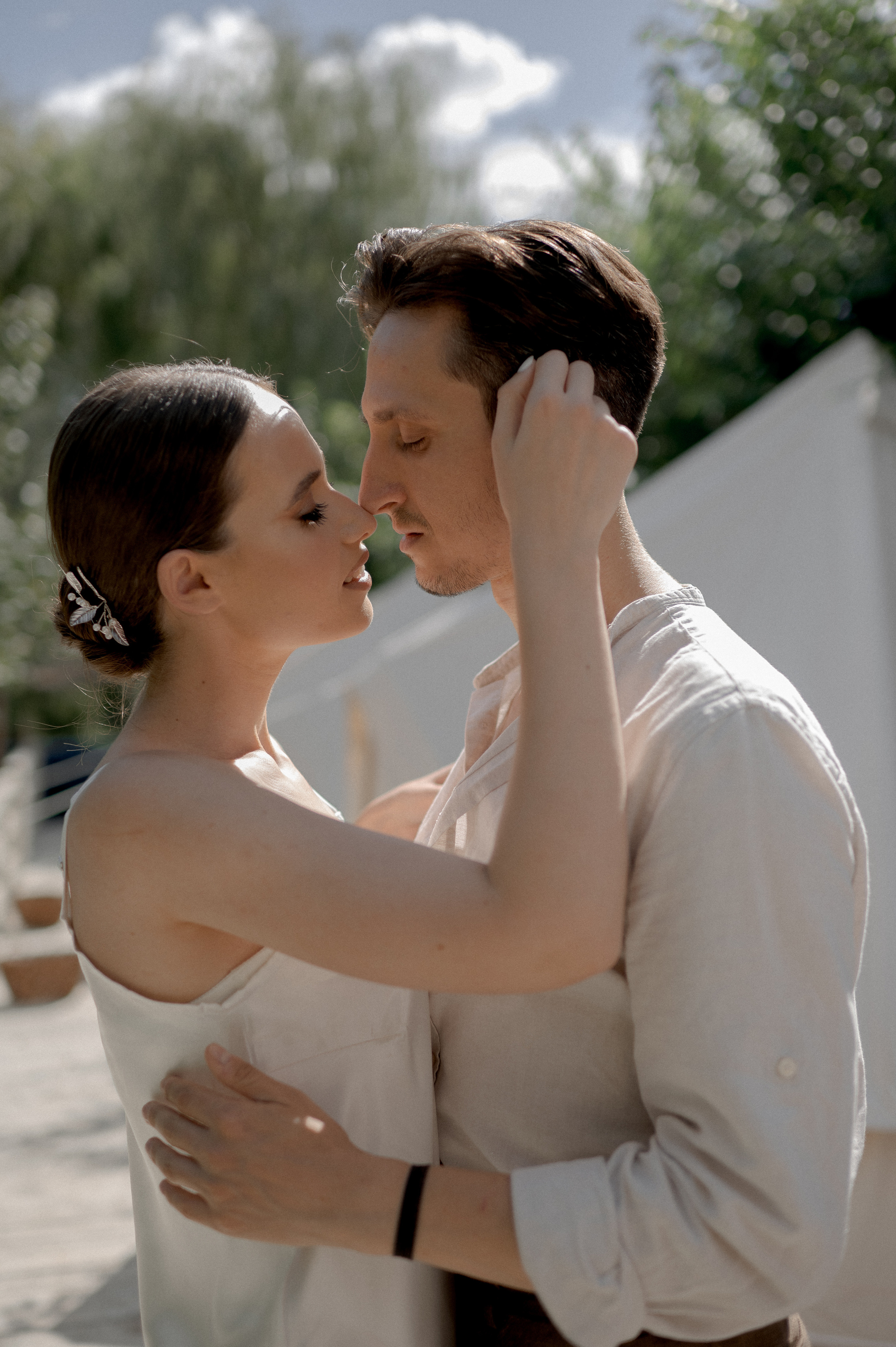 The couple's wedding morning is filled with warmth and intimacy in a secluded garden