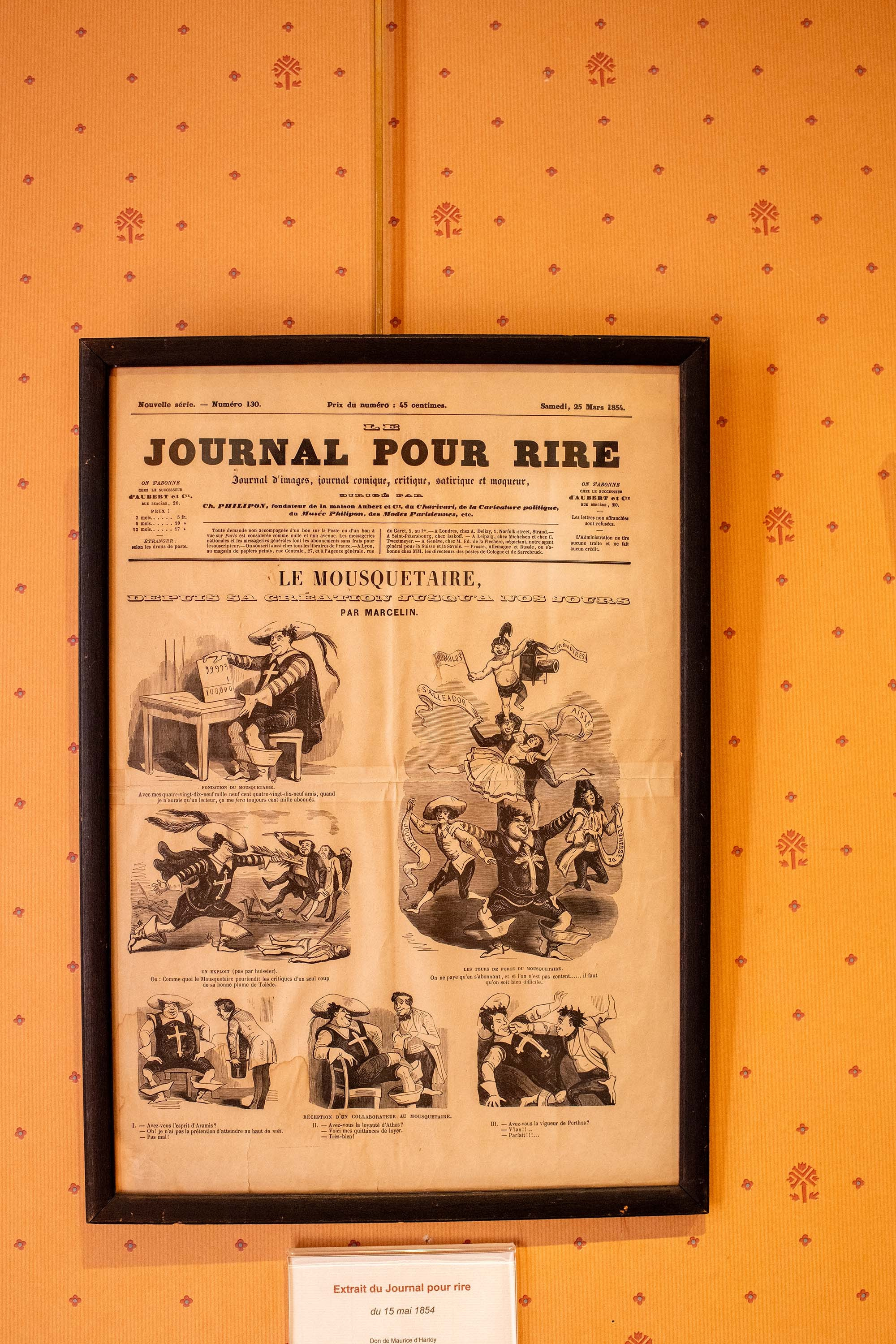 Historic Le Journal pour Rire featuring a satirical illustration inspired by The Three Musketeers at Château de Monte-Cristo near Paris