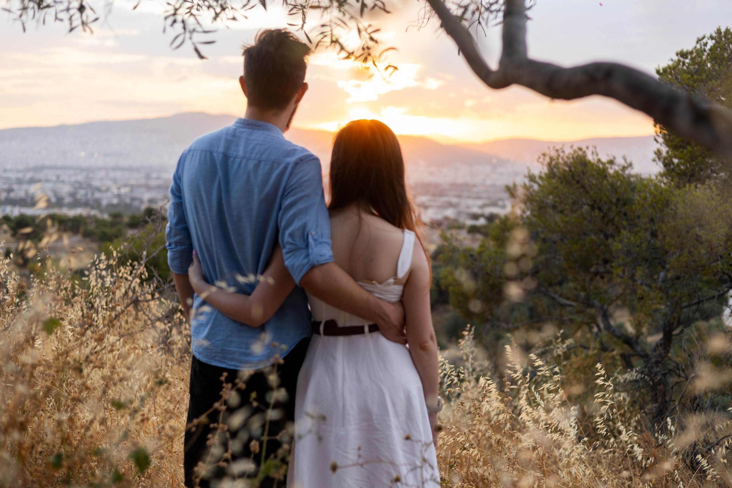 Couple watching the sunset together