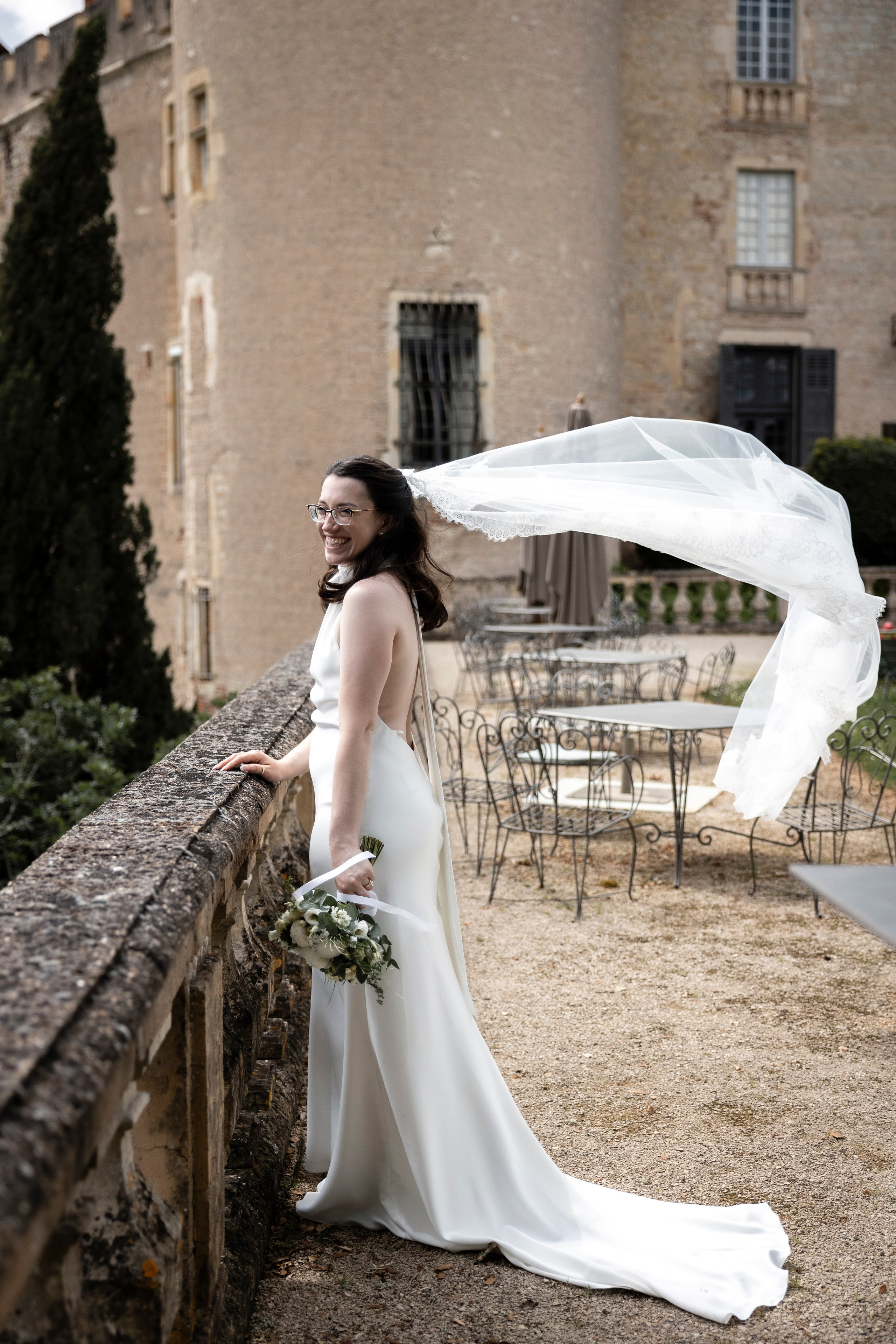 Bridal portrait with bouquet during an elopement at Château Mercuès