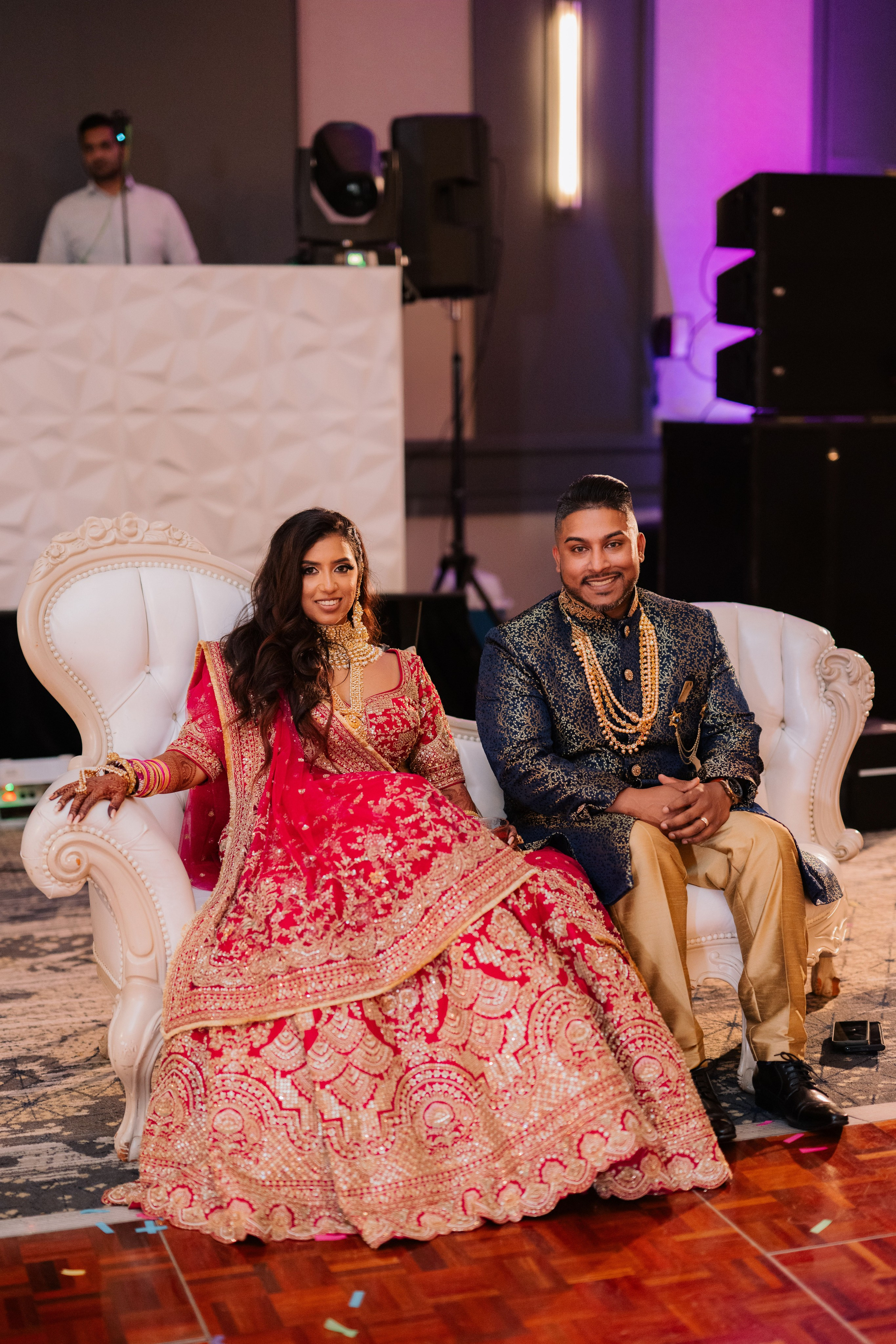 a man and woman sitting on a couch