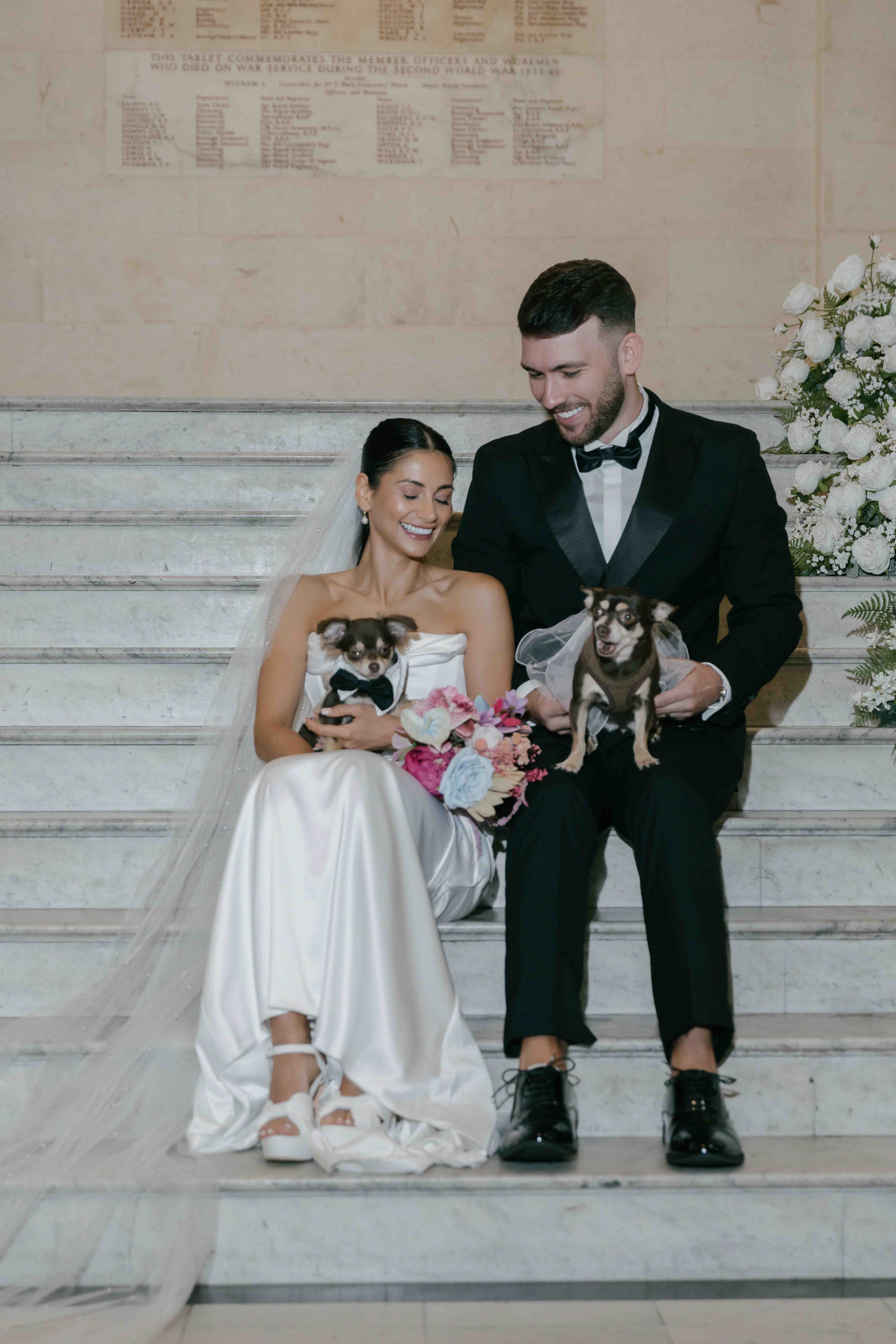 intimate wedding with dogs London bride and groom with pets Marylebone Town Hall candid emotional moment UK