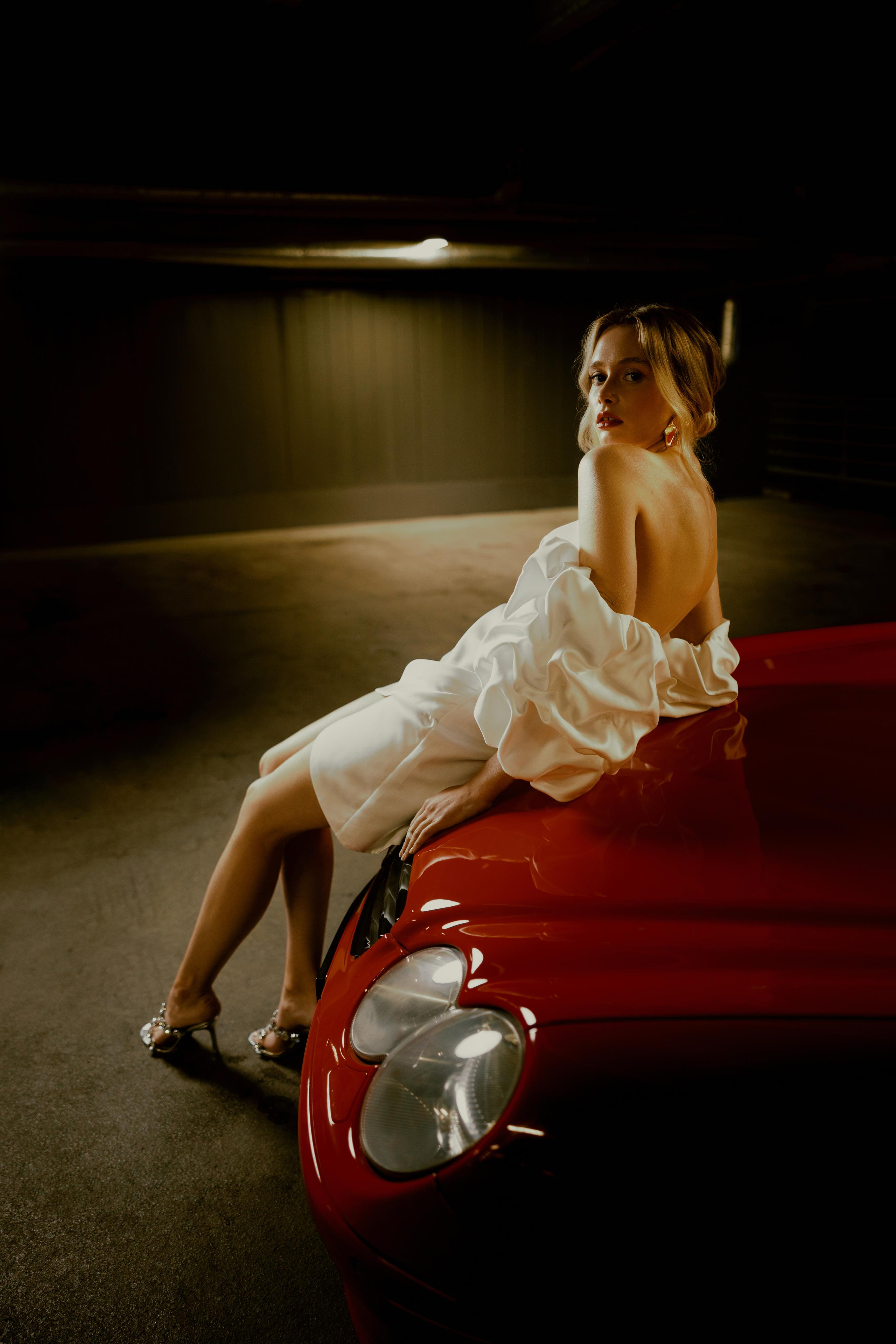 Bride in Red Cabrio. @atpho.to portrait photographer in Tallinn, Estonia