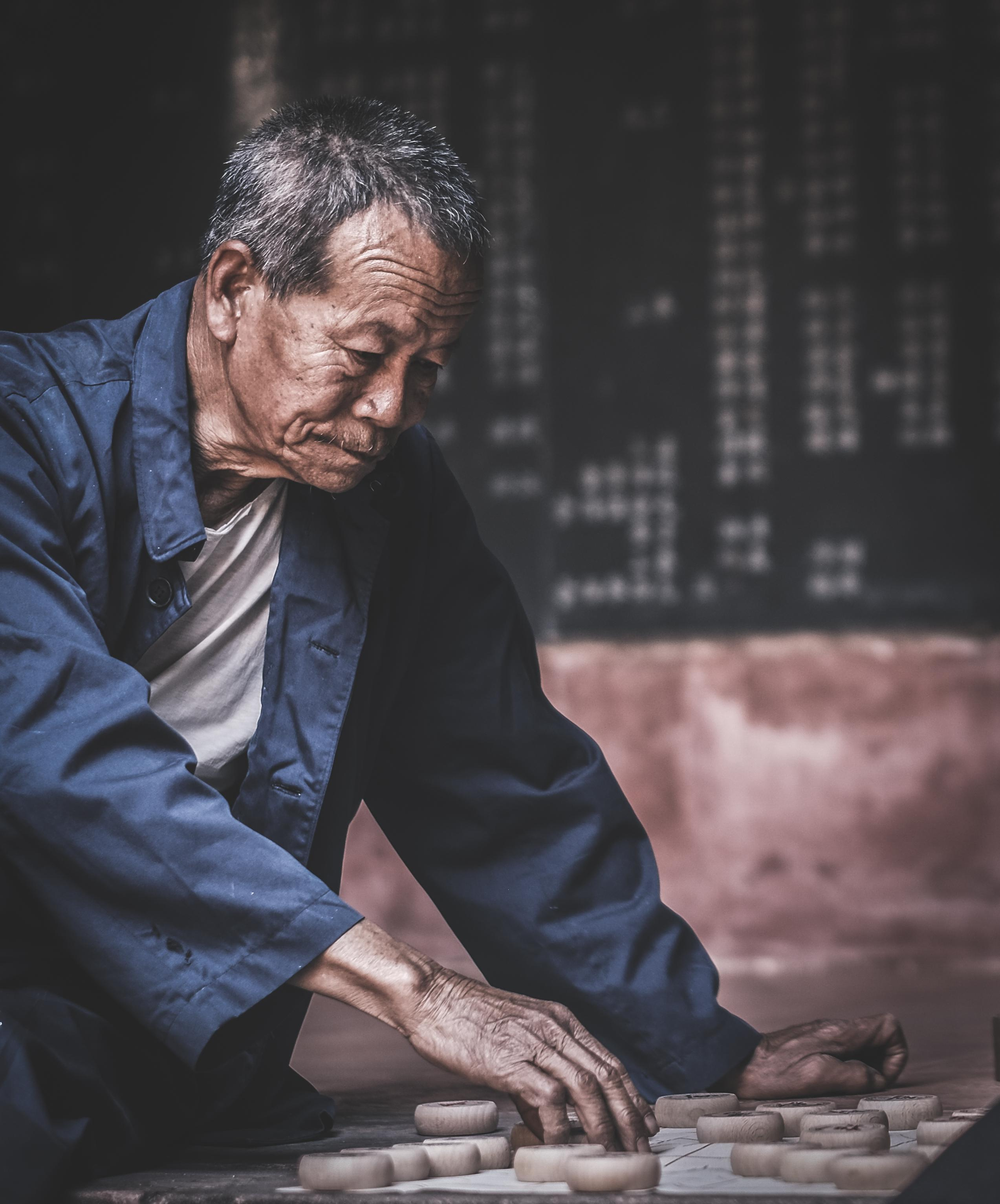 Chinese Chess ( 象棋 )in Dongguan | Street Photography | Dongguan | China | 中国象棋在东莞 | 街头摄影| 东莞 | 中国. Xiangqi, also called Chinese chess or Elephant chess, is a strategy board game for two players. It is one of the most popular board games in China, and is in the same family of games as Western chess, chaturanga, shogi, Indian chess and janggi.