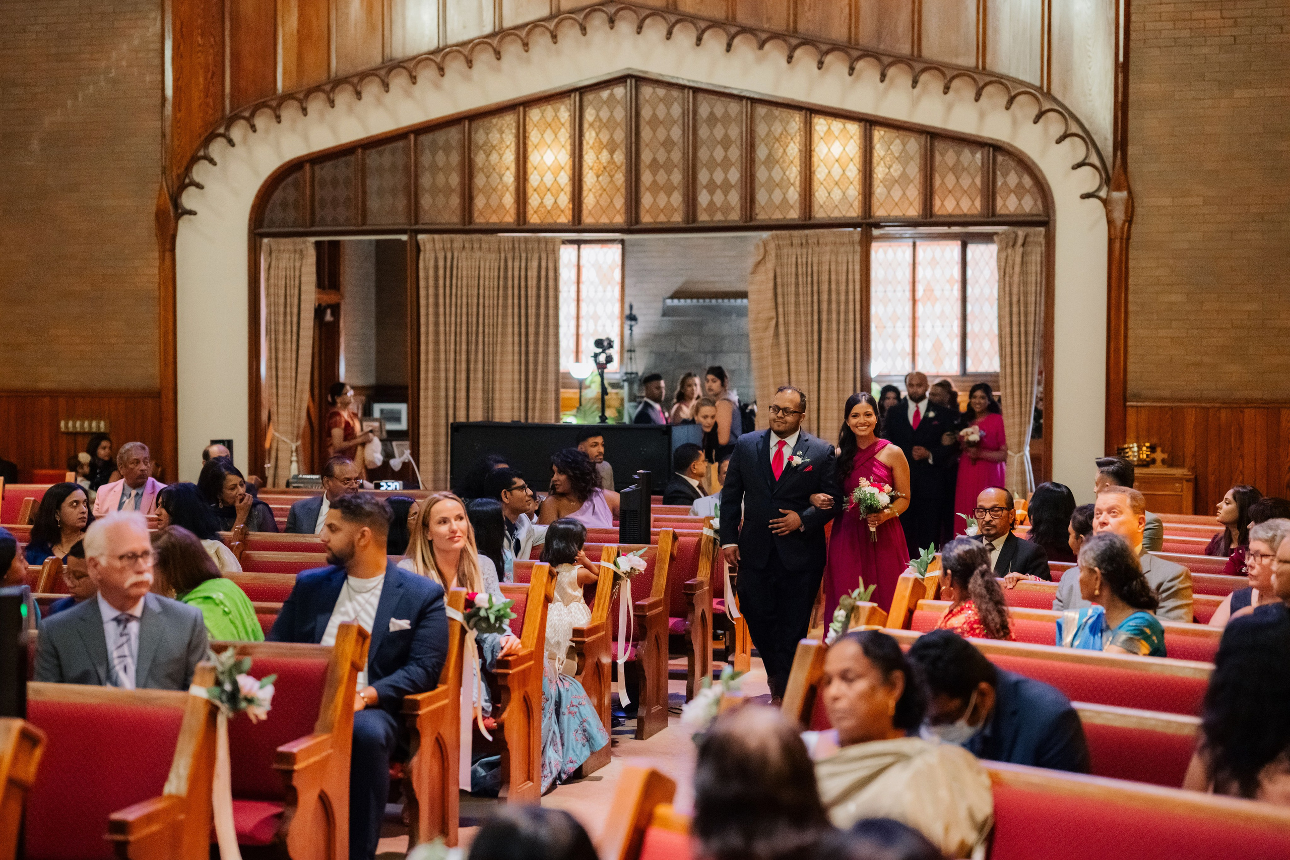 a group of people sitting in a church