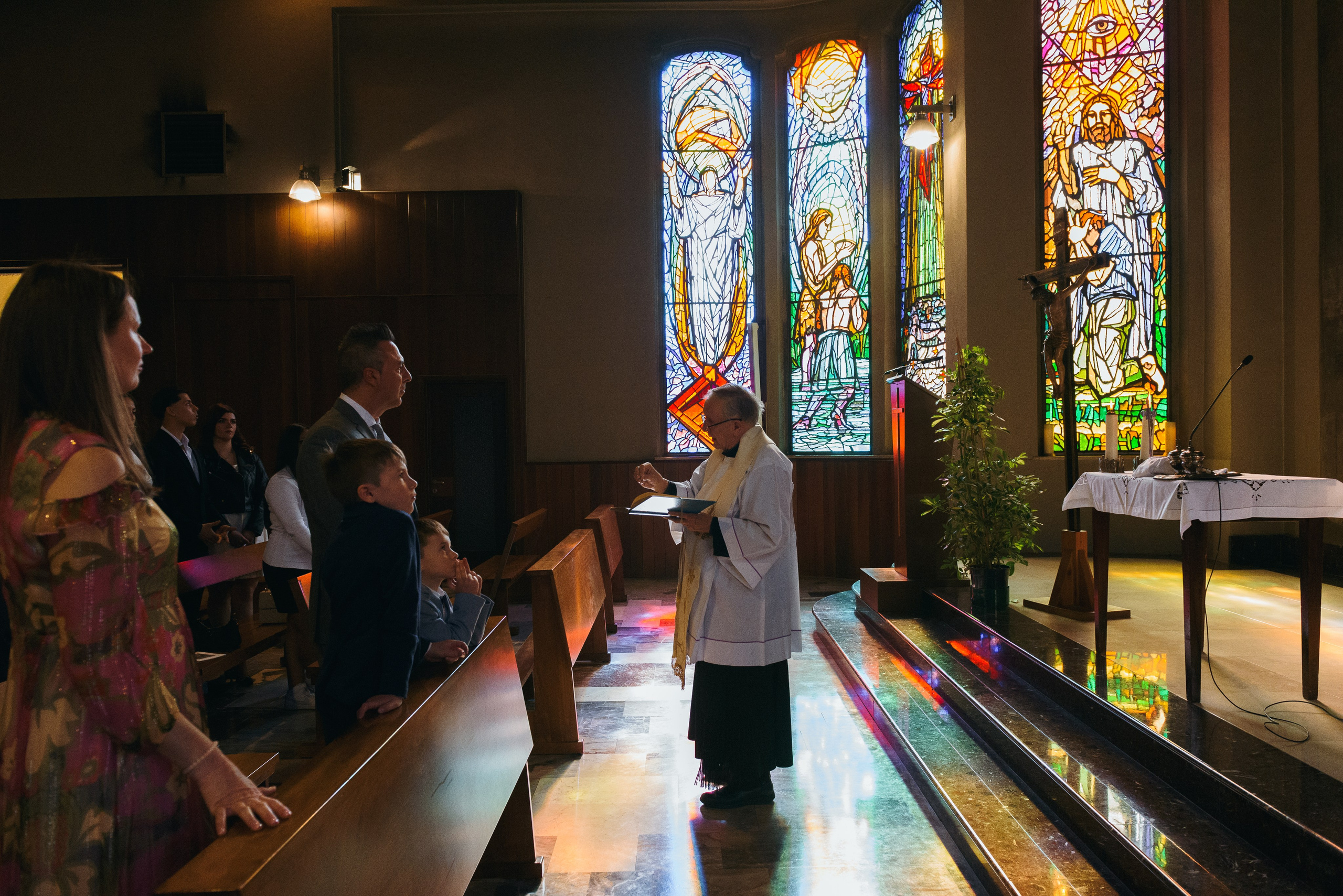 Baptism photography in Milan and nearby areas. Anastasiia Buchinskaia Photographer in Milan