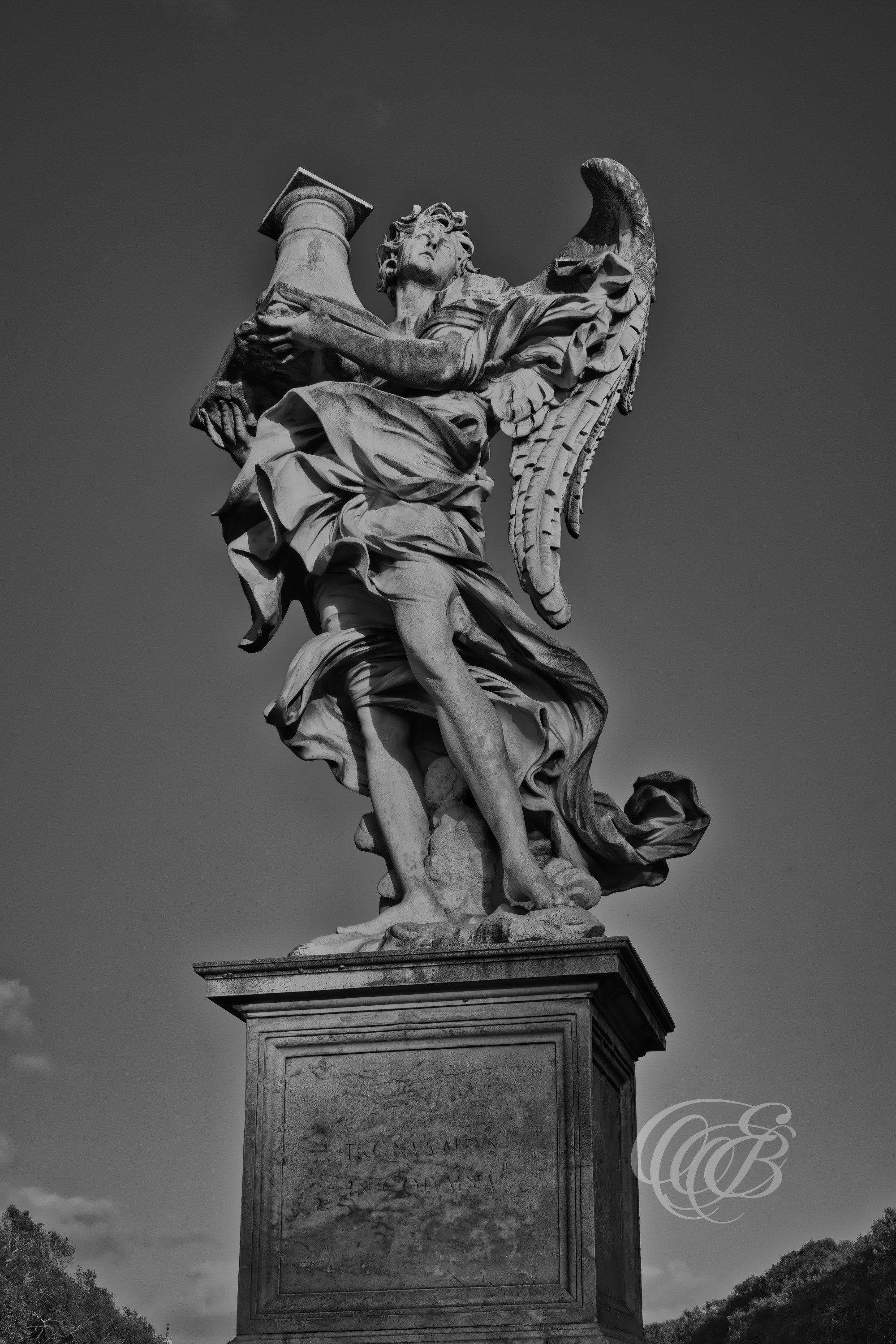 Rome Italy - The Angel carrying the column - B&W - Eduardo Bartoli Fine Art Photography - Black and white fine art photograph of the angel carrying the column statue in Rome, Italy – photography by Eduardo Bartoli.