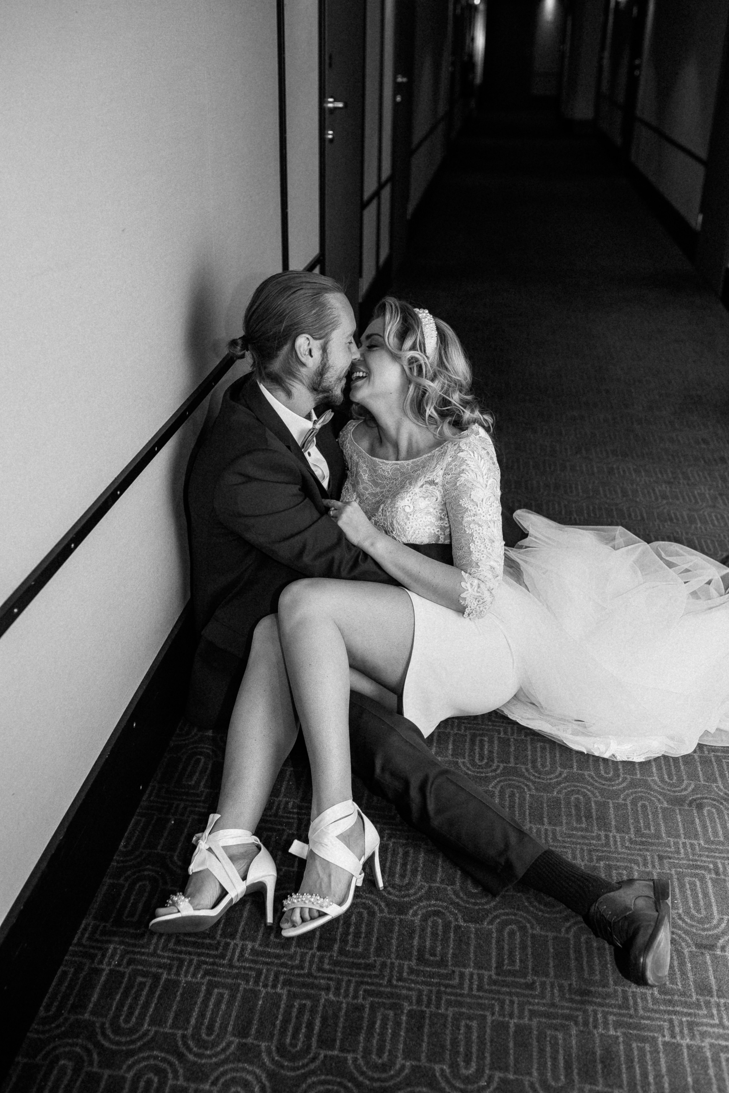 Bride and groom sharing a romantic moment in Helsinki, Finland.