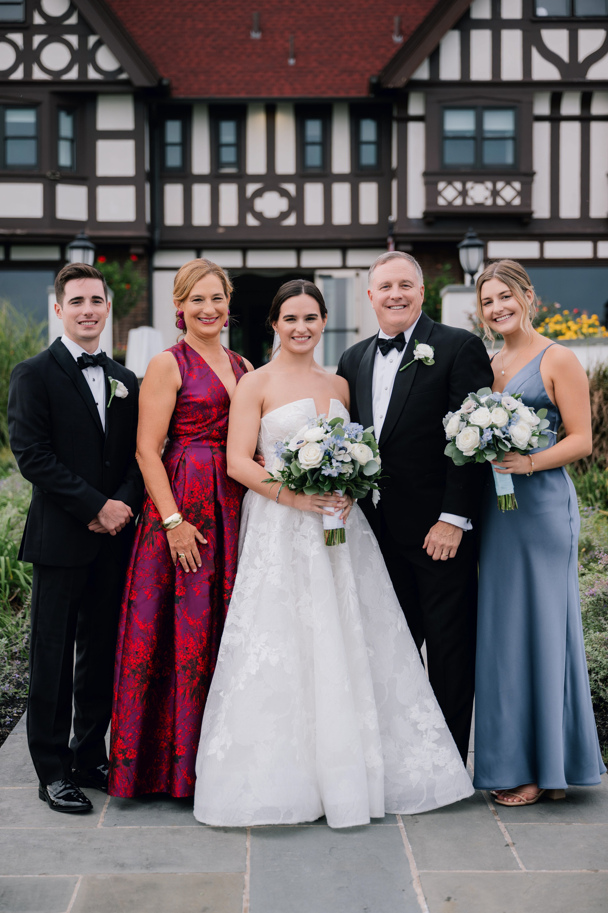 a bride and groom with their bridesmas
