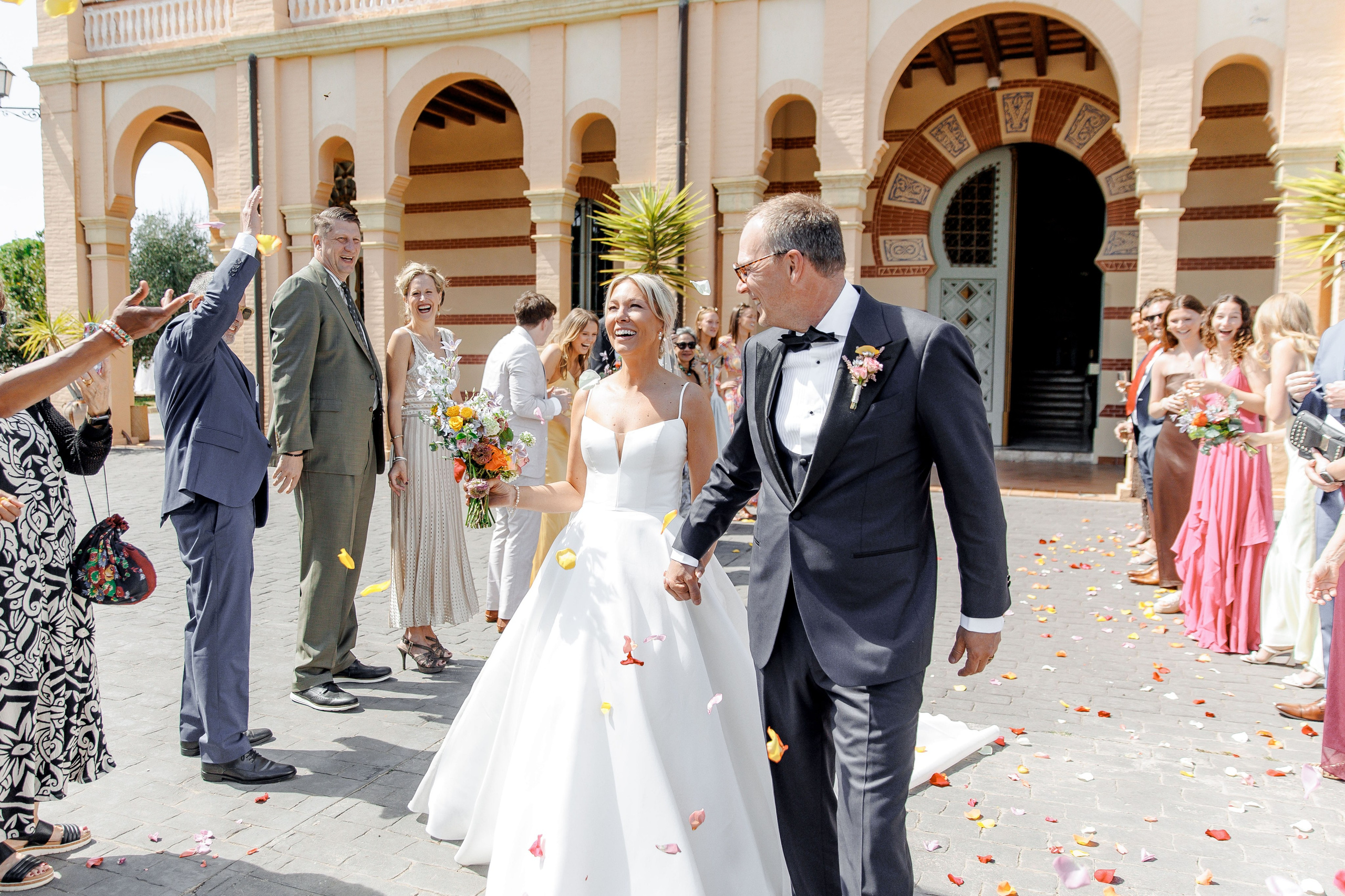 Candid wedding moment in Barcelona, capturing genuine emotions and joyful interactions.