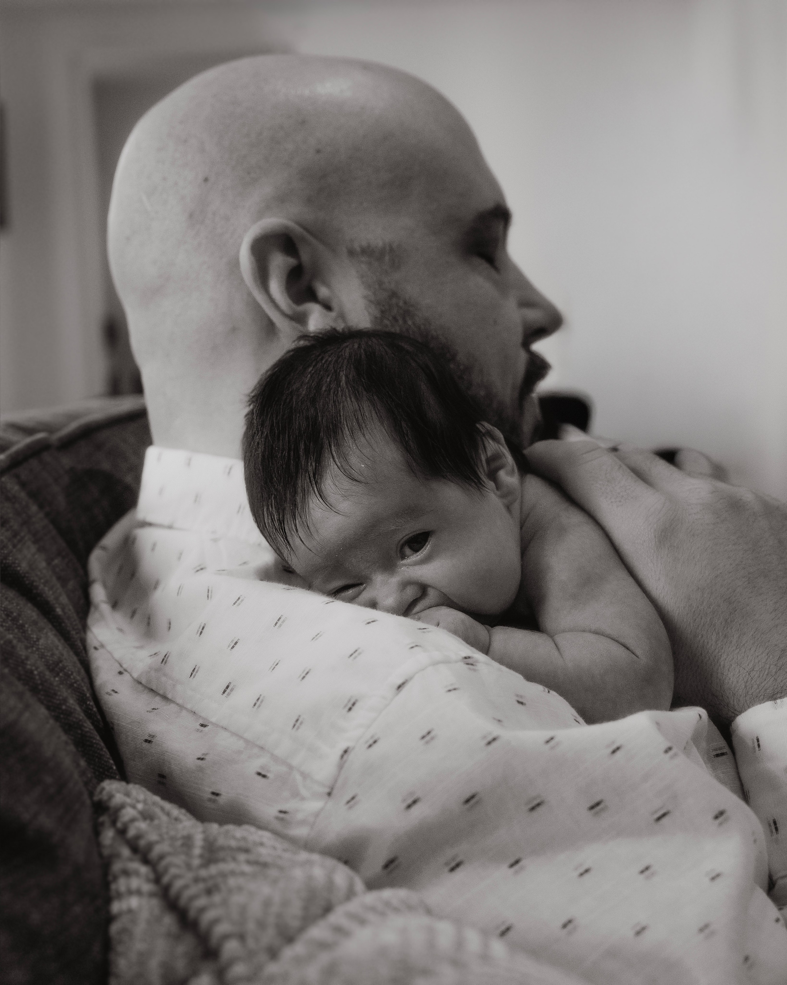 Father comforting his baby, intimate and heartfelt scene