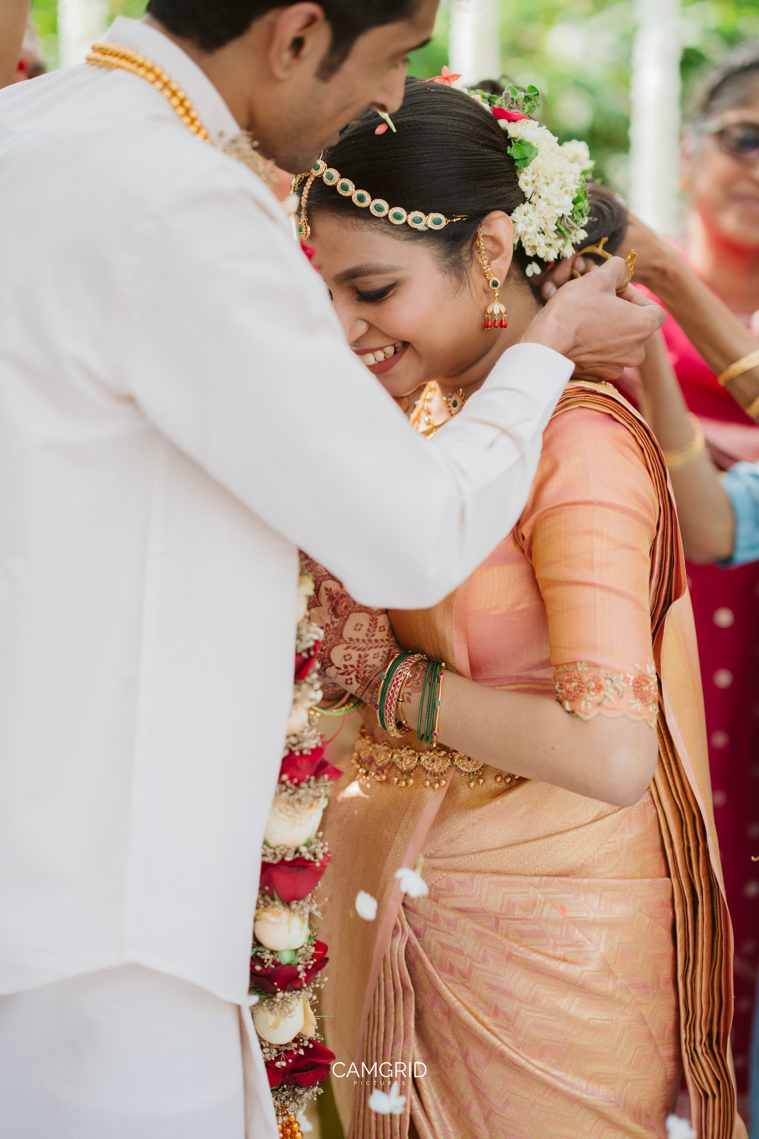 Emotional wedding photography by Camgrid Pictures Kerala