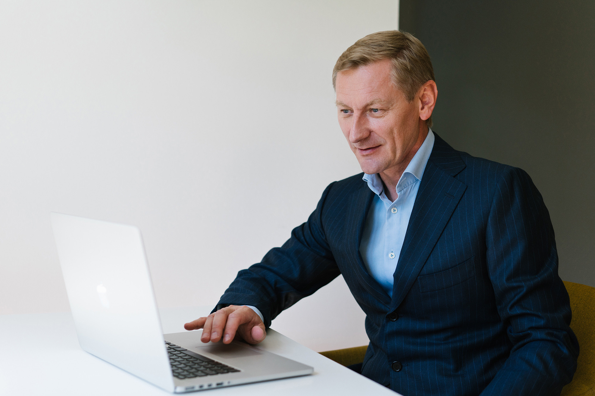 Man working on the laptop for life and natural business portraits