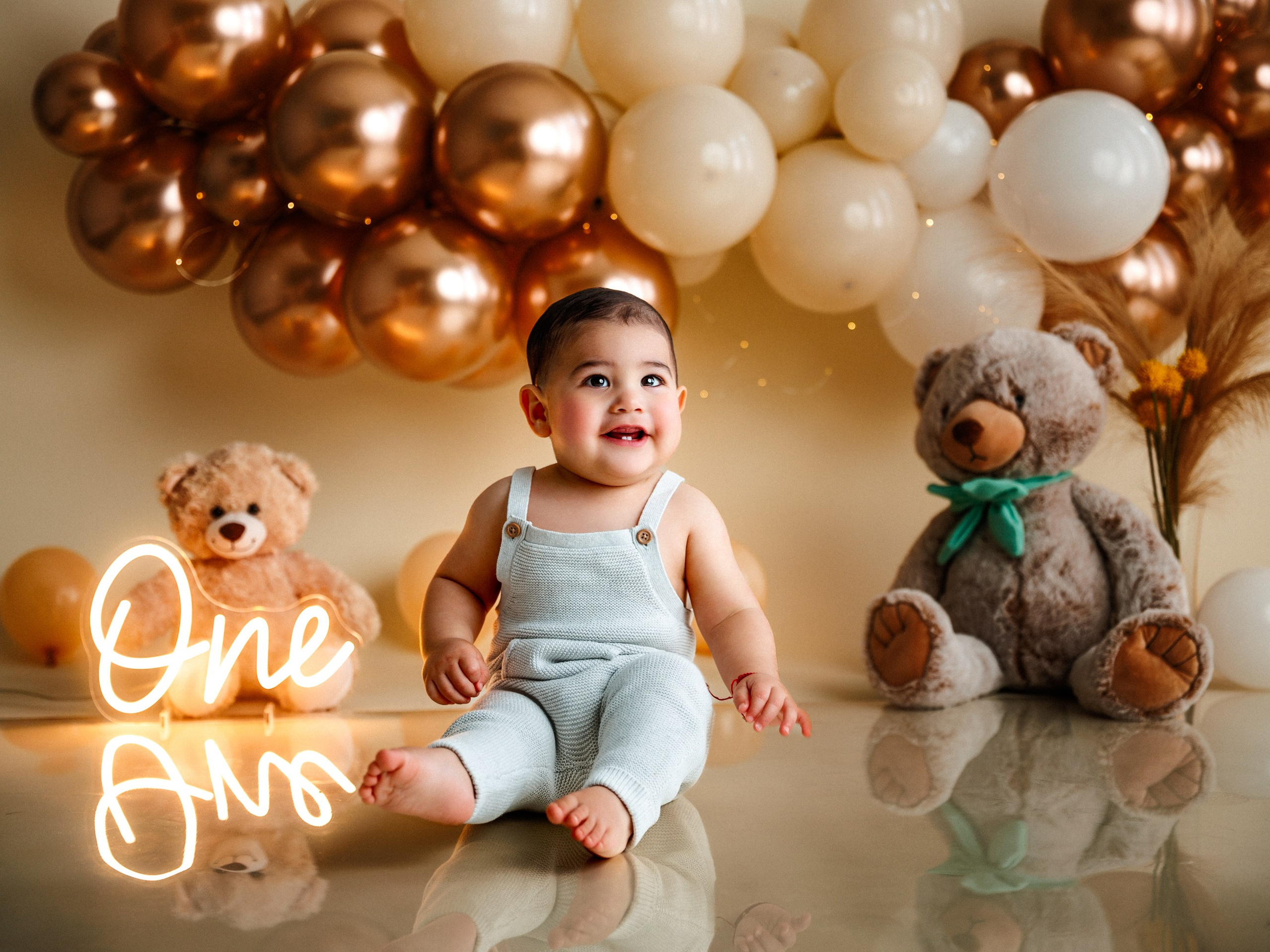 First birthday cake smash studio session with custom organic balloon garland Indianapolis