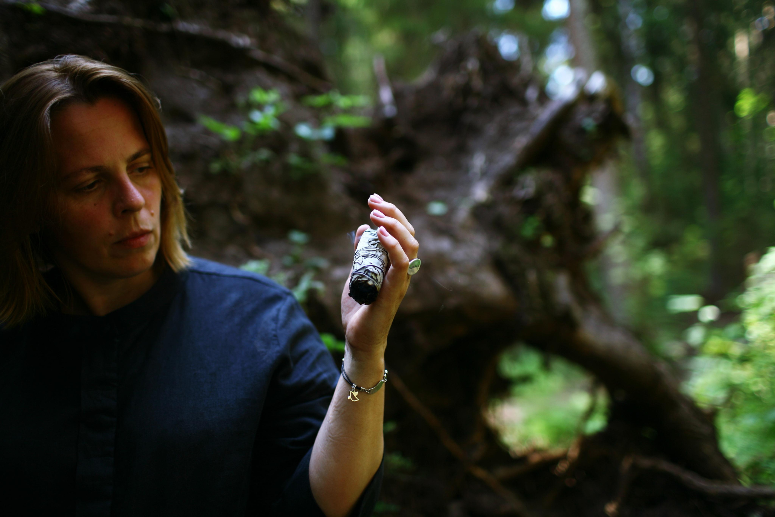 Anna, by herself. Woods and a little bit fire. Victoria Dini. Art photography in London / Folkestone, UK