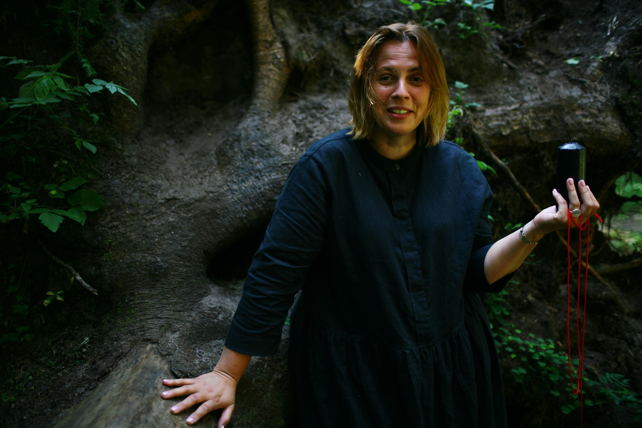 Anna, by herself. Woods and a little bit fire. Victoria Dini. Art photography in London / Folkestone, UK