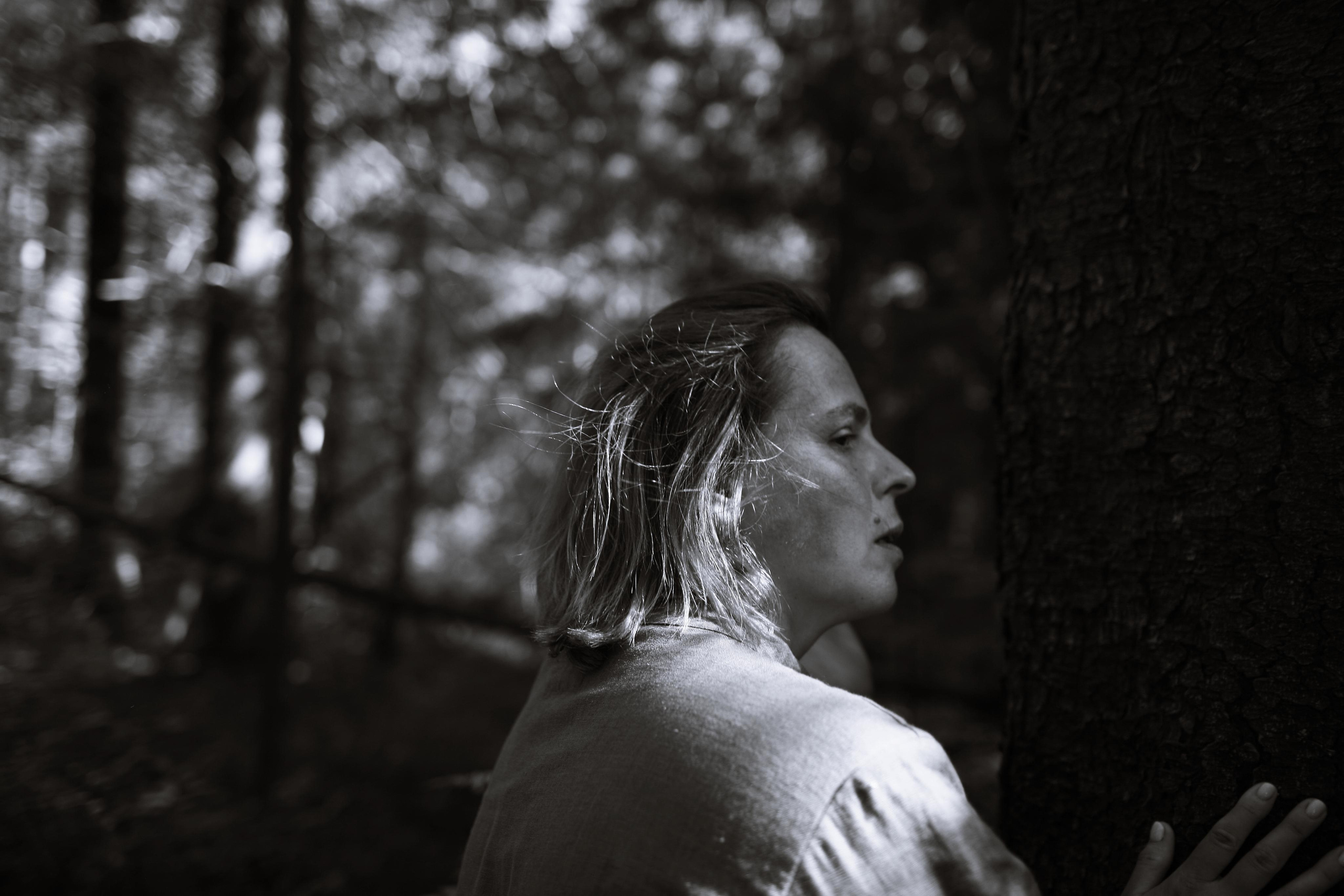 Anna, by herself. Woods and a little bit fire. Victoria Dini. Art photography in London / Folkestone, UK