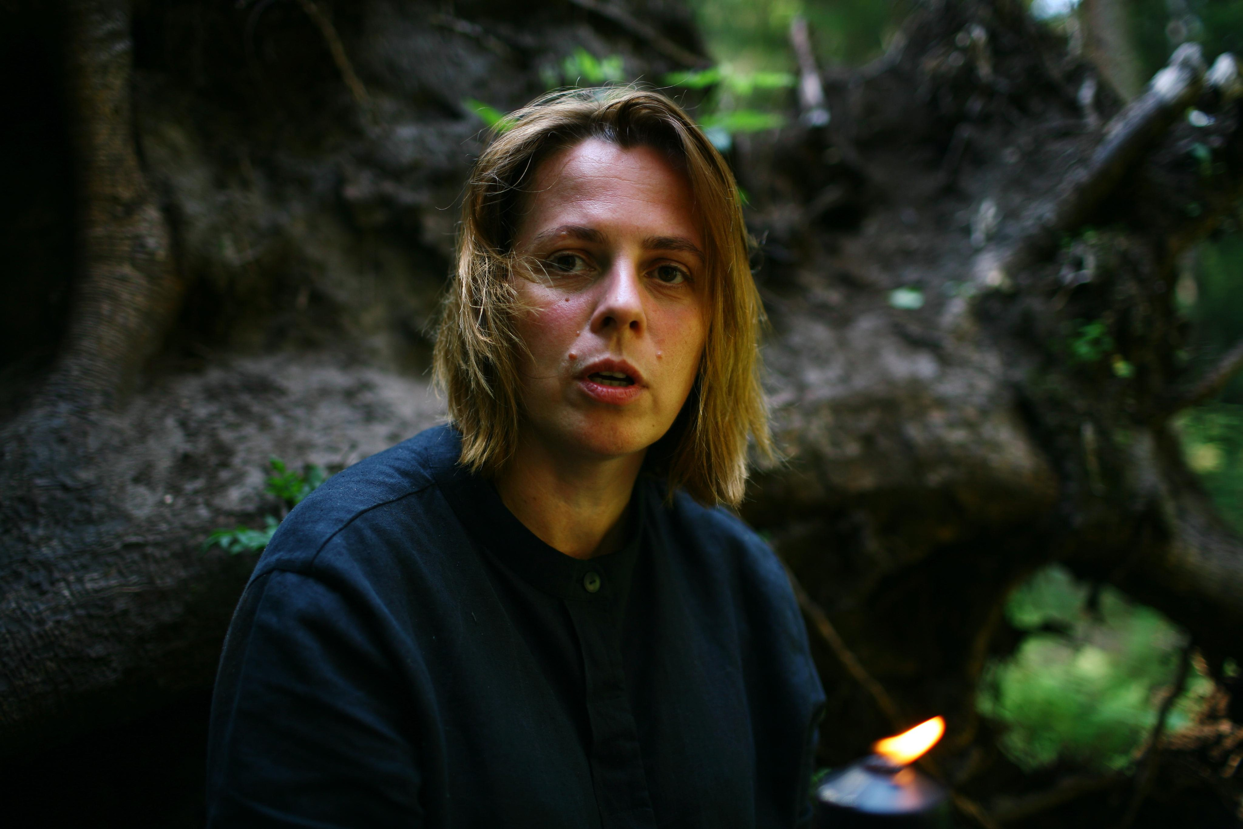 Anna, by herself. Woods and a little bit fire. Victoria Dini. Art photography in London / Folkestone, UK