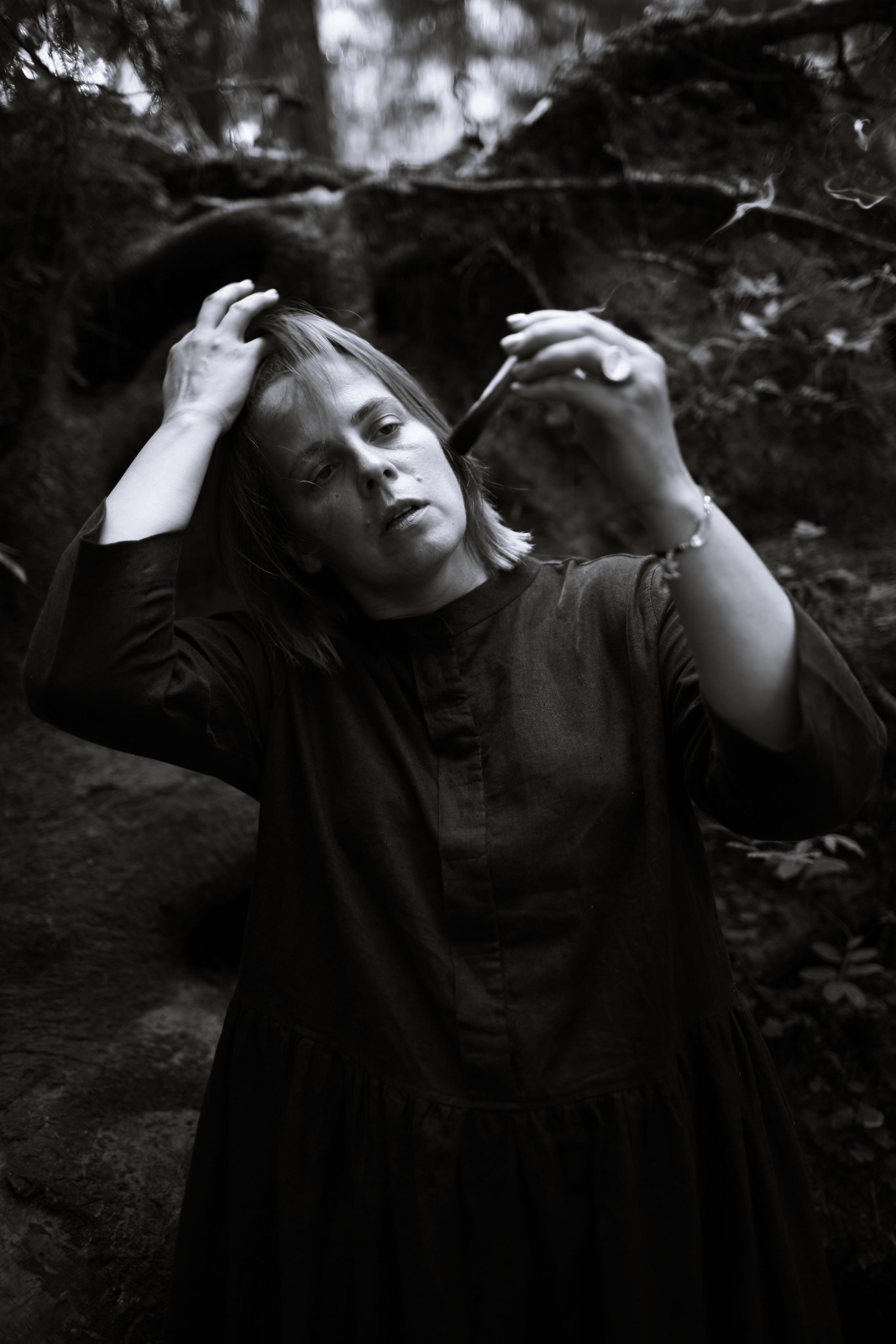 Anna, by herself. Woods and a little bit fire. Victoria Dini. Art photography in London / Folkestone, UK