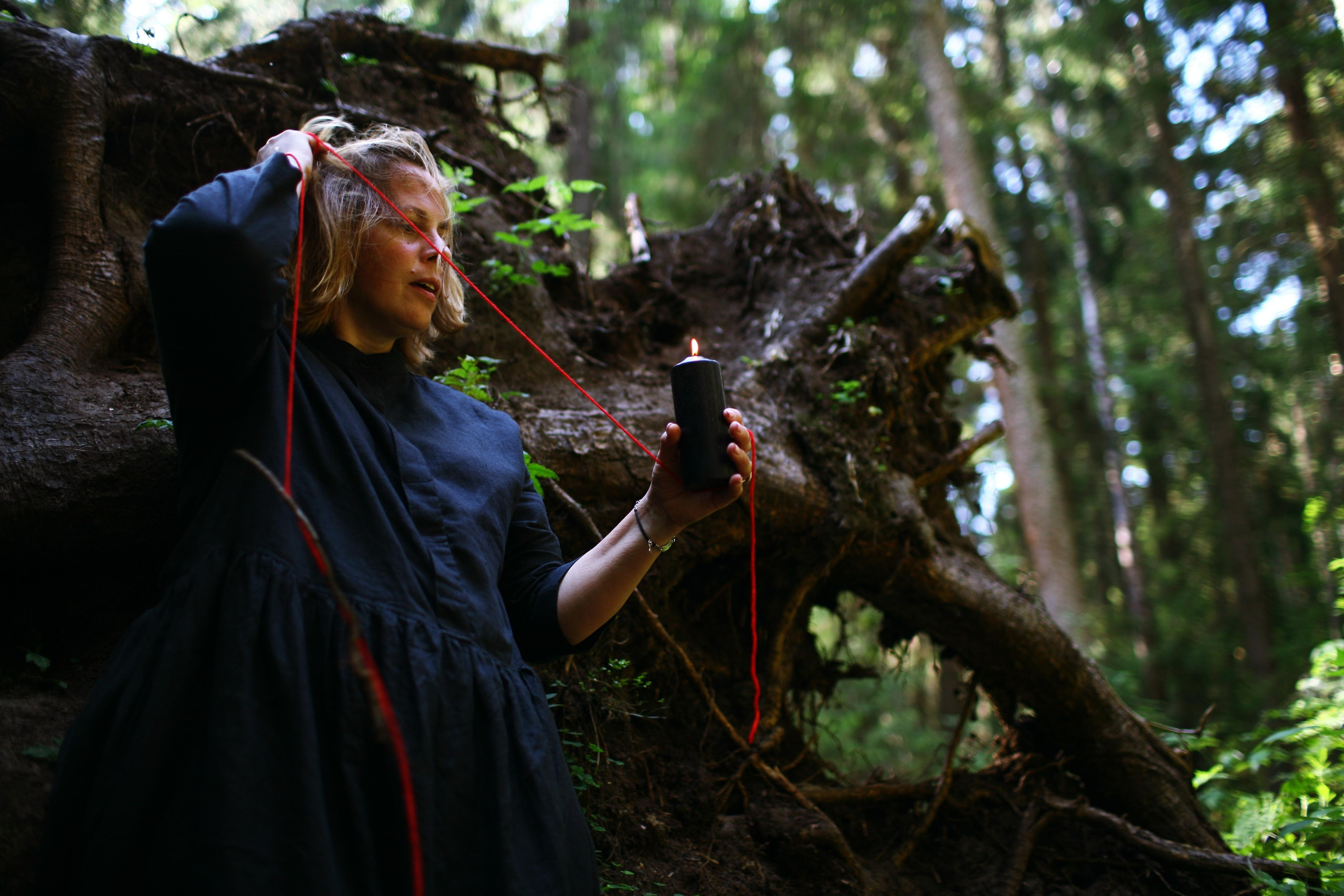 Anna, by herself. Woods and a little bit fire. Victoria Dini. Art photography in London / Folkestone, UK