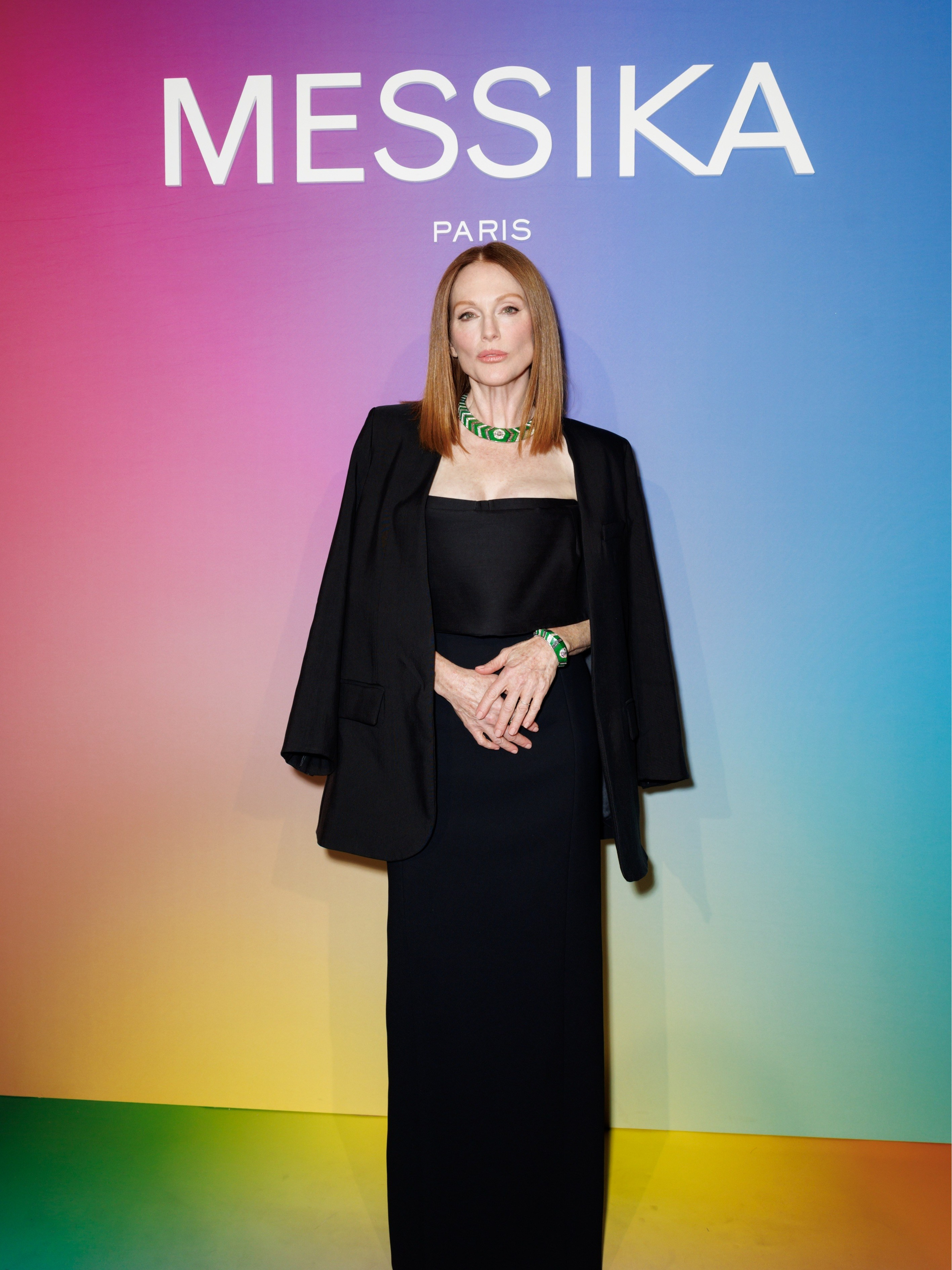 Model posing at Messika event backdrop – luxury NYC photography