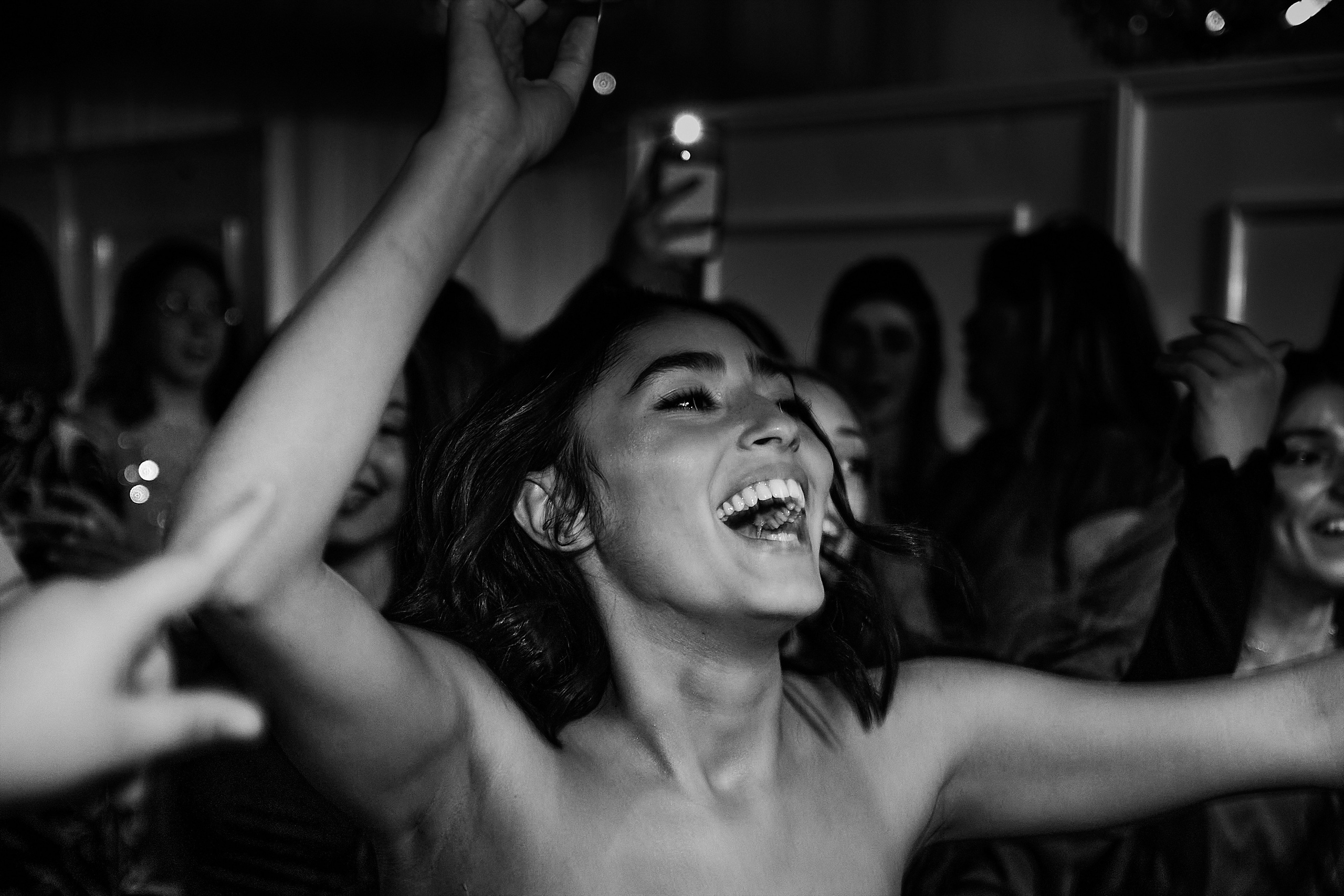 Bride joyful dancing at wedding party