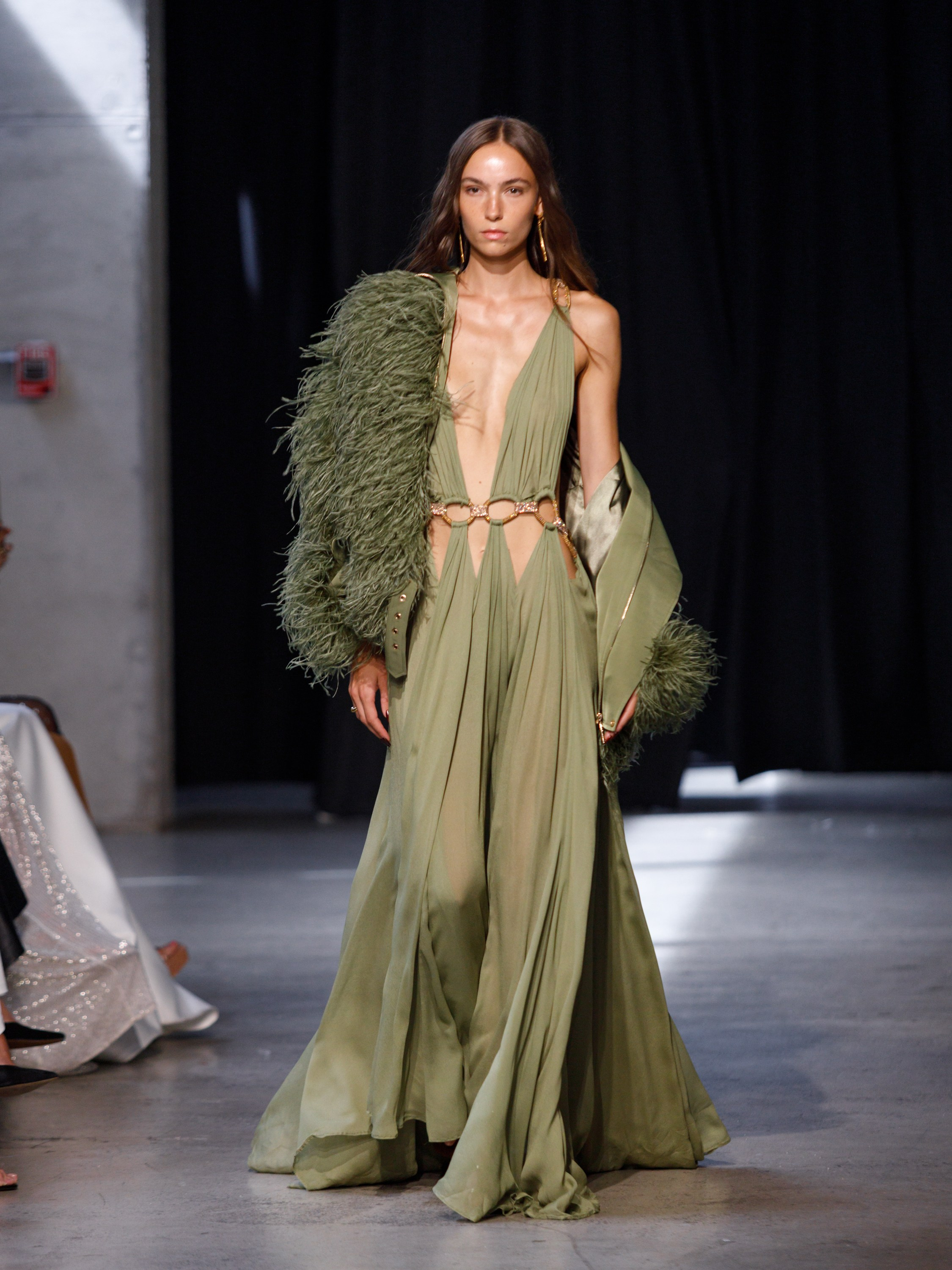 Runway model in green couture gown – NYC fashion show