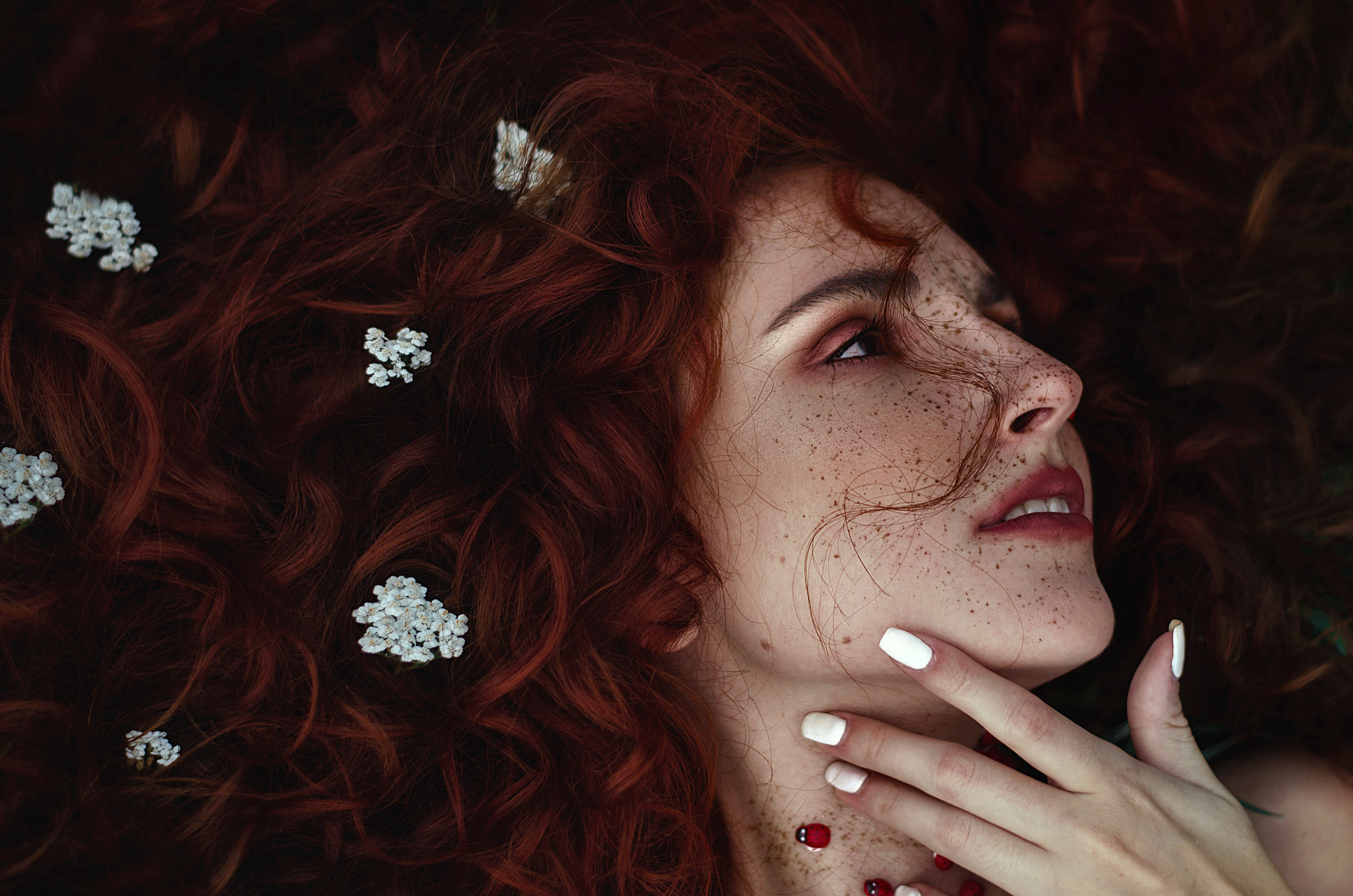 Beauty model test shoot with natural soft lighting, showcasing high-end makeup artistry.