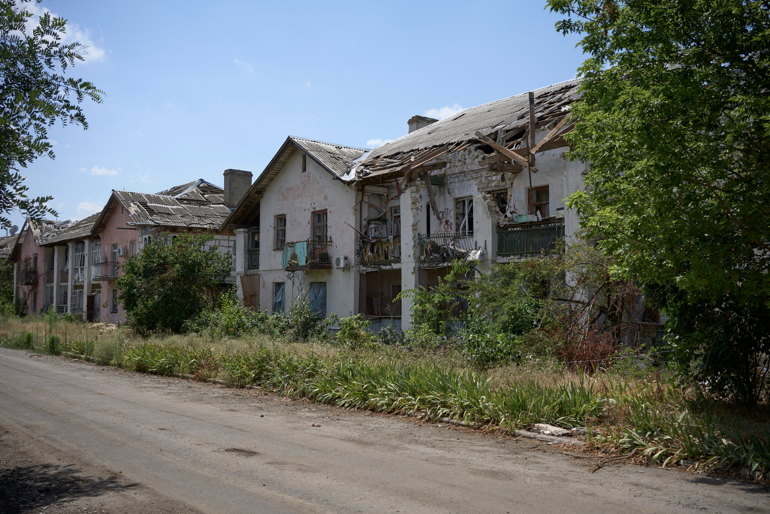 Damaged buildings in the dormitory area of Luch after shelling.
