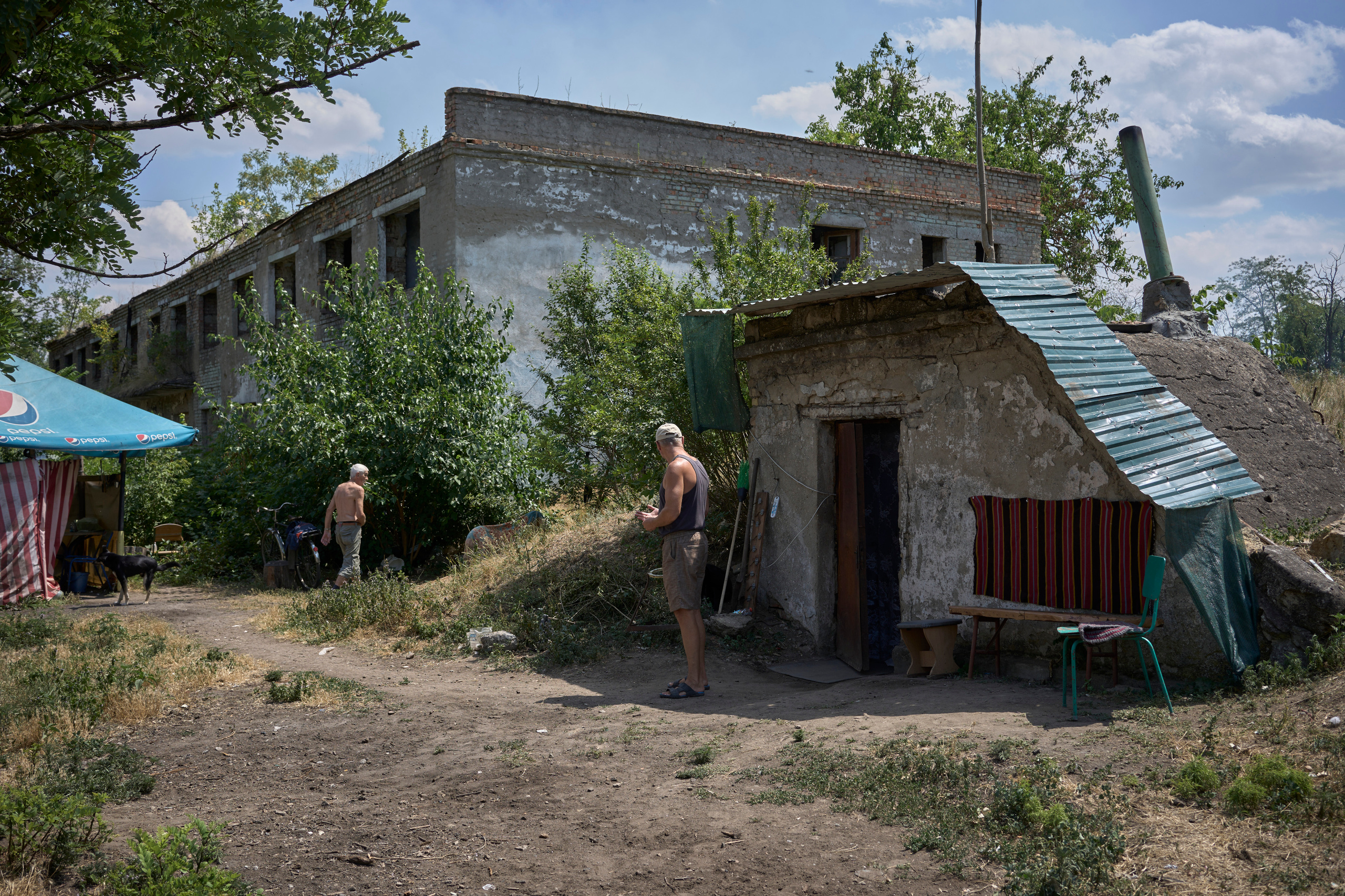 People by the civilian shelter.