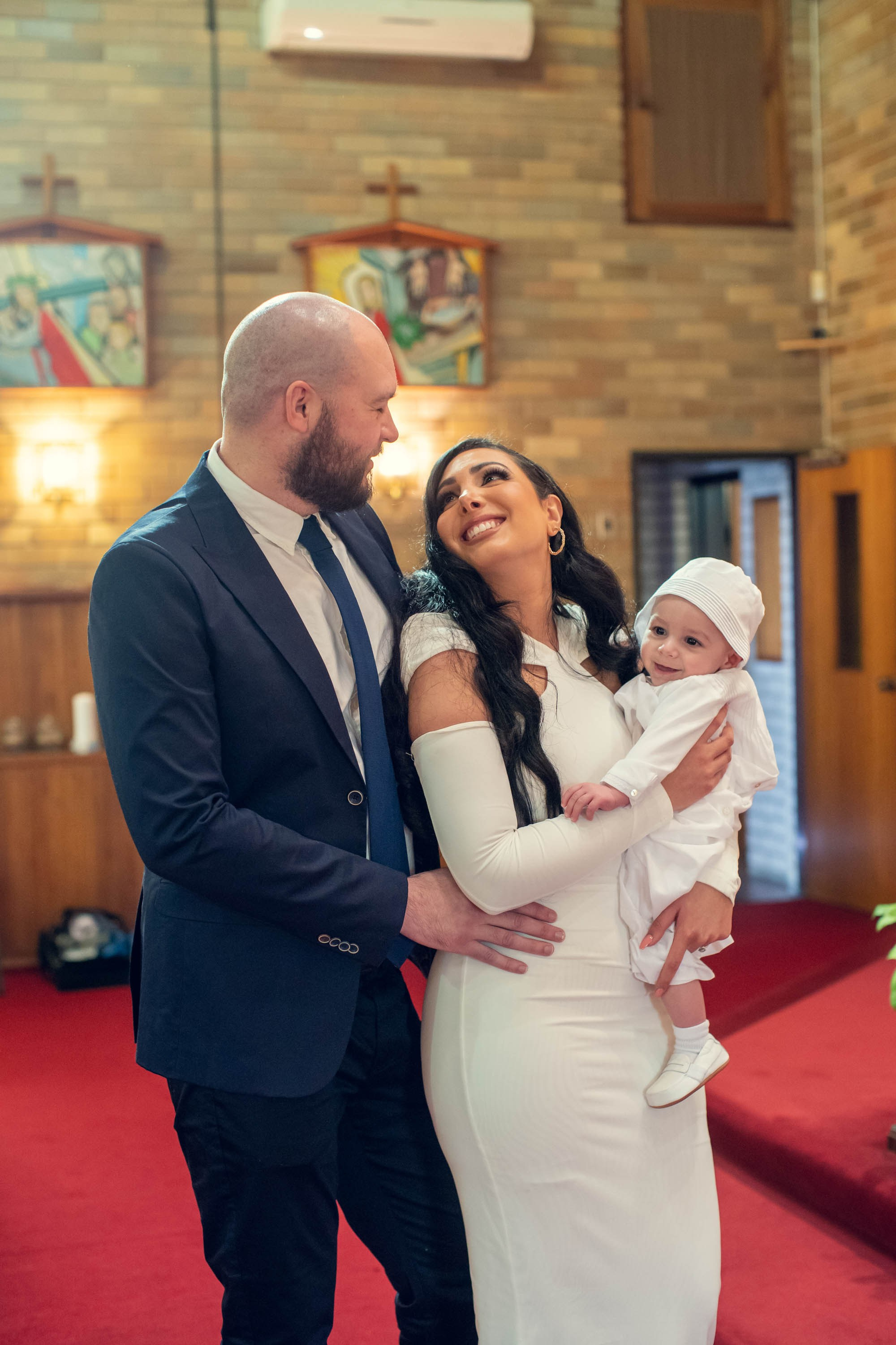 christening photography Sydney, baptism photographer Sydney, baby christening photos, family photographer Sydney, natural light christening photos, church christening photography, reception photography, candid family moments, christening day storytelling, full christening photoshoot experience