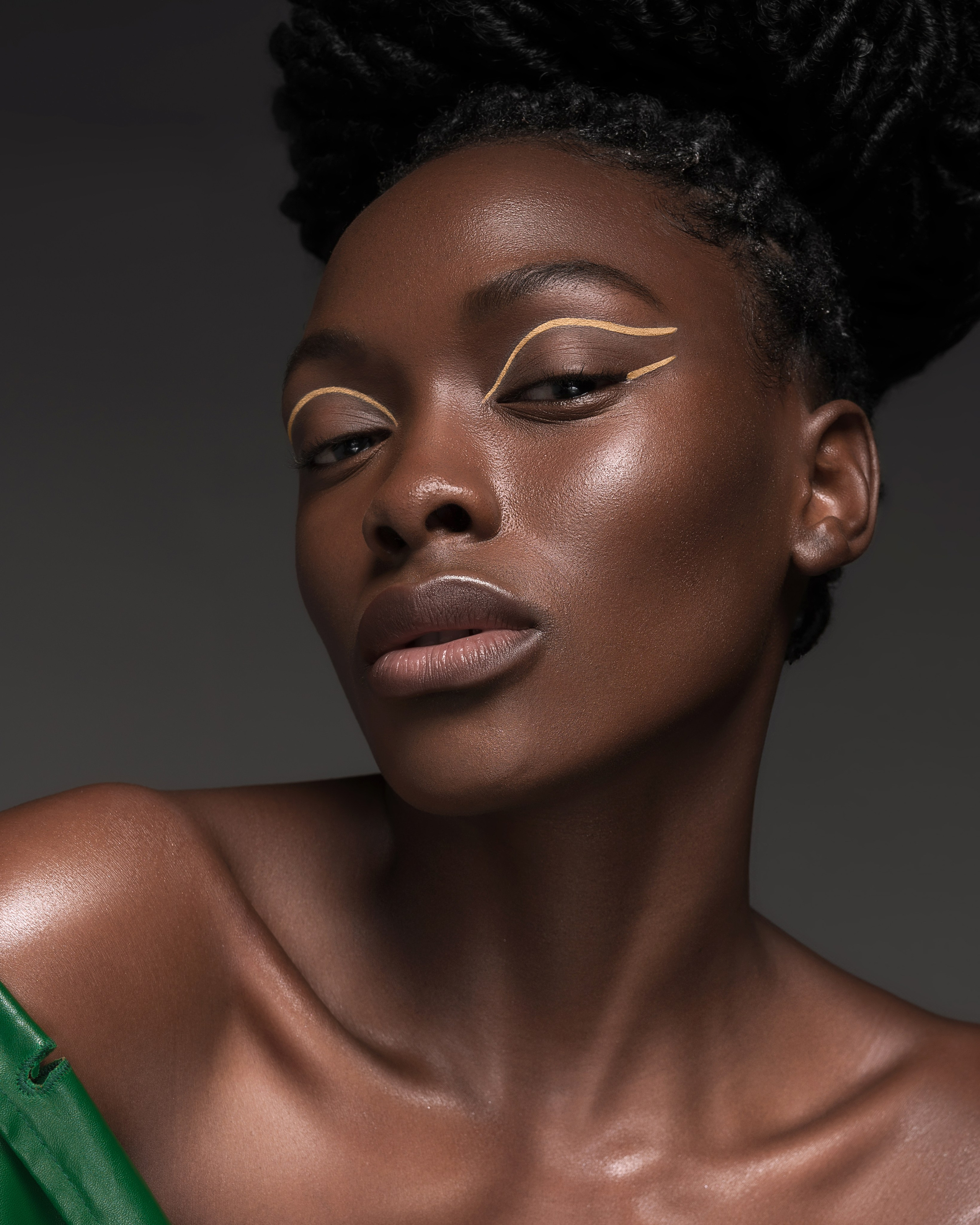 Professional makeup photography with high-end retouching, close-up beauty shot for an MUA portfolio.